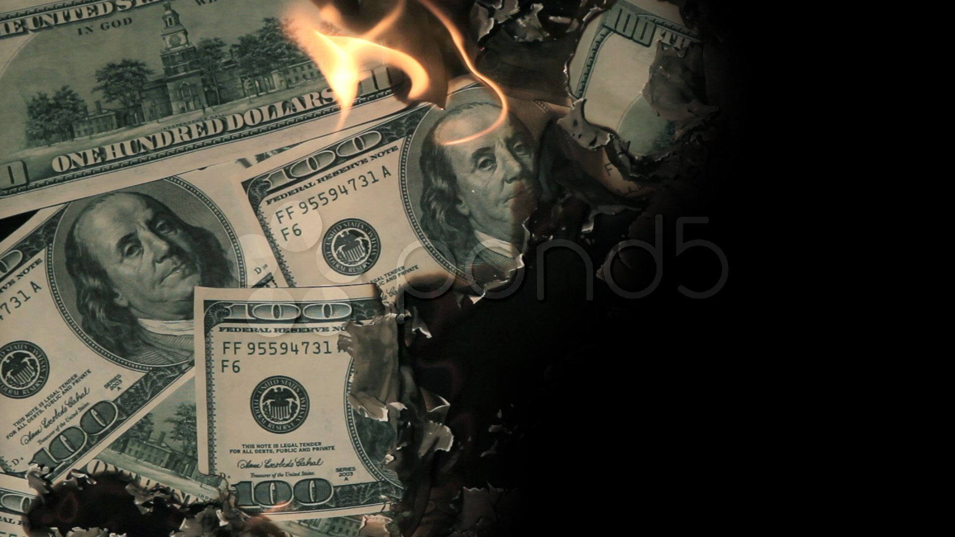Money burning on a black background.<ref> 1080p stock footage</ref><box>(10,10),(989,987)</box>. - Money