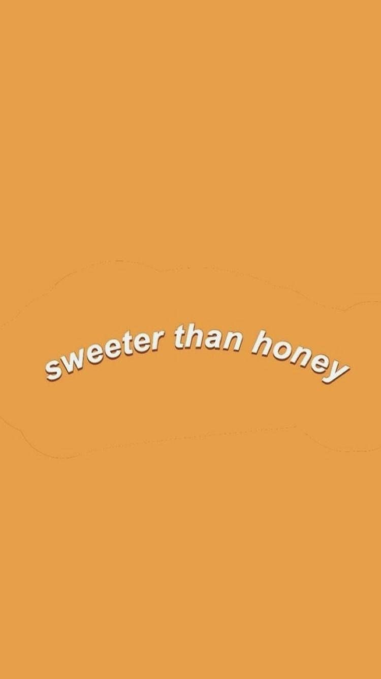Orange aesthetic wallpaper with the words 