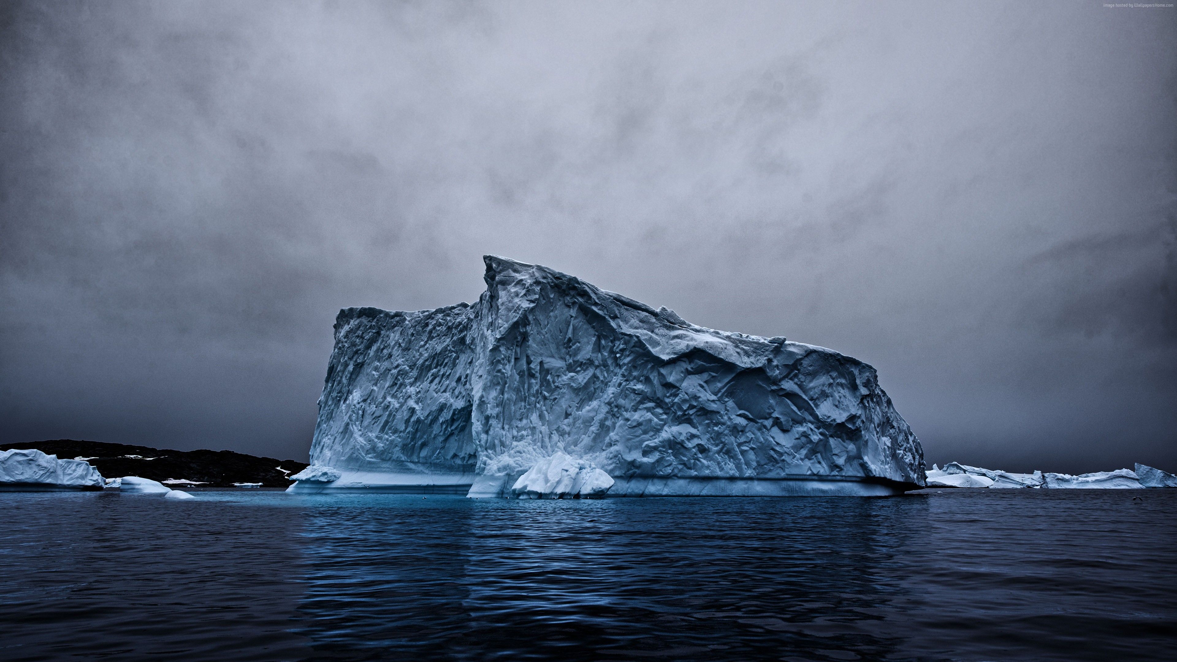 Iceberg in the ocean, dark clouds, 5K wallpaper - Travel