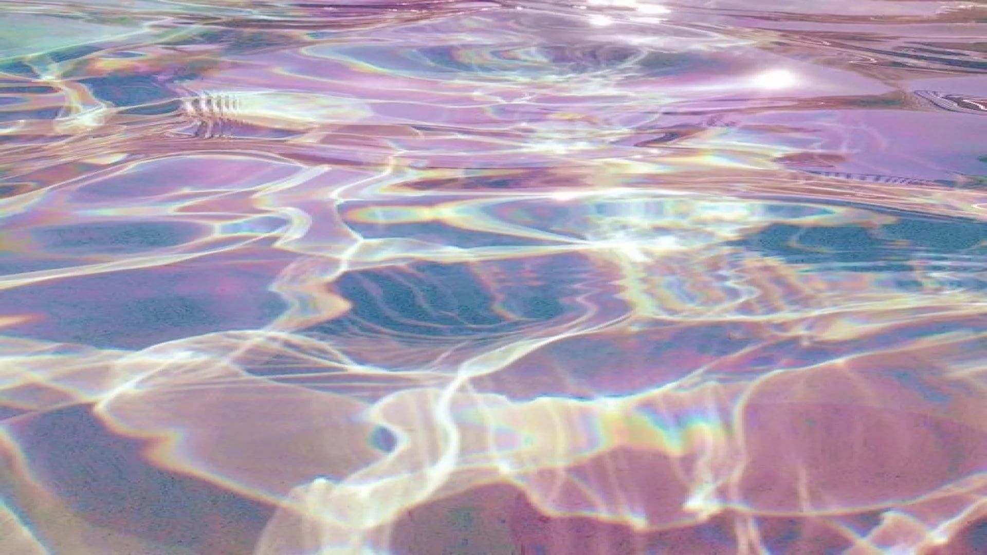 A close up of water with reflections in it - Water