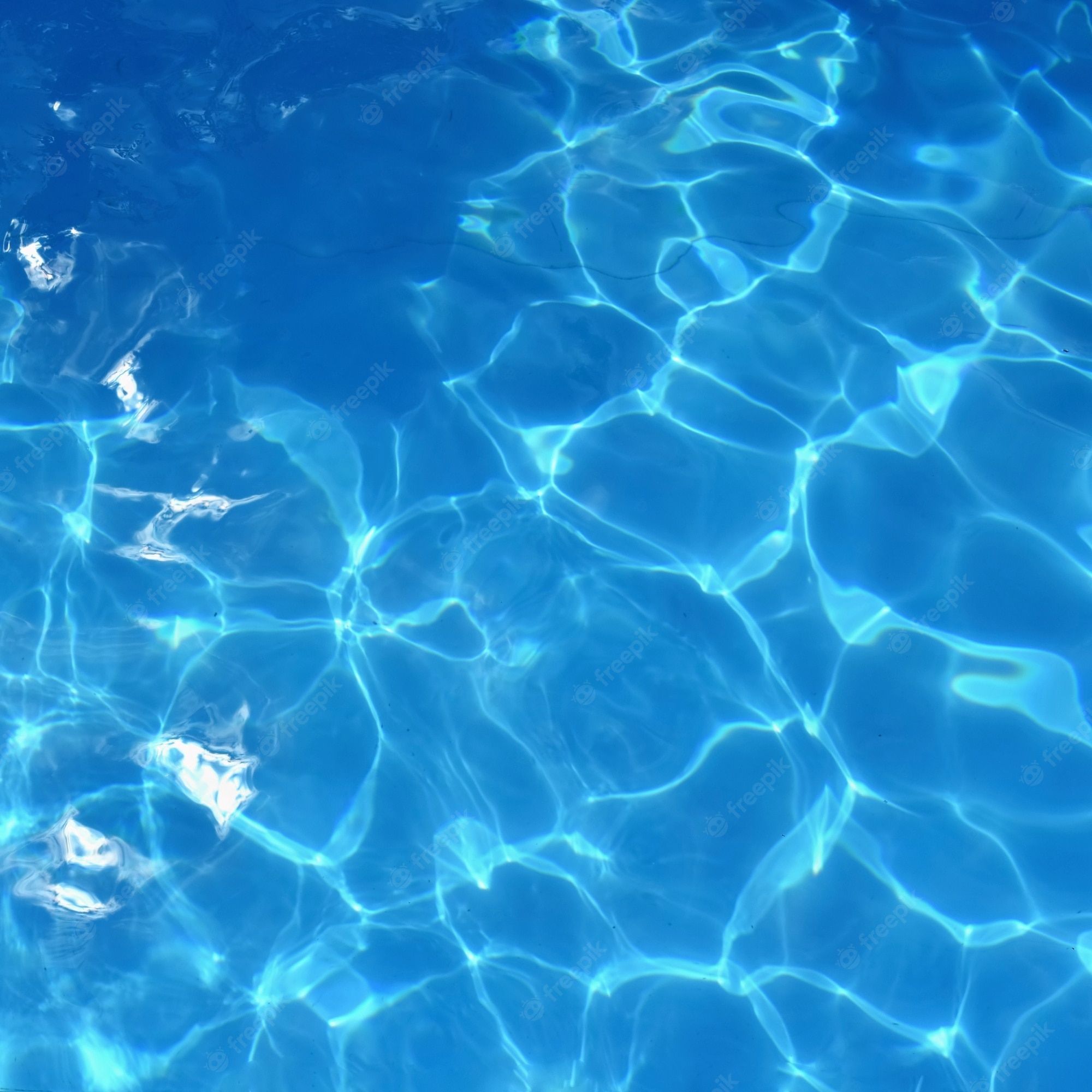 A pool with crystal clear blue water - Water, swimming pool