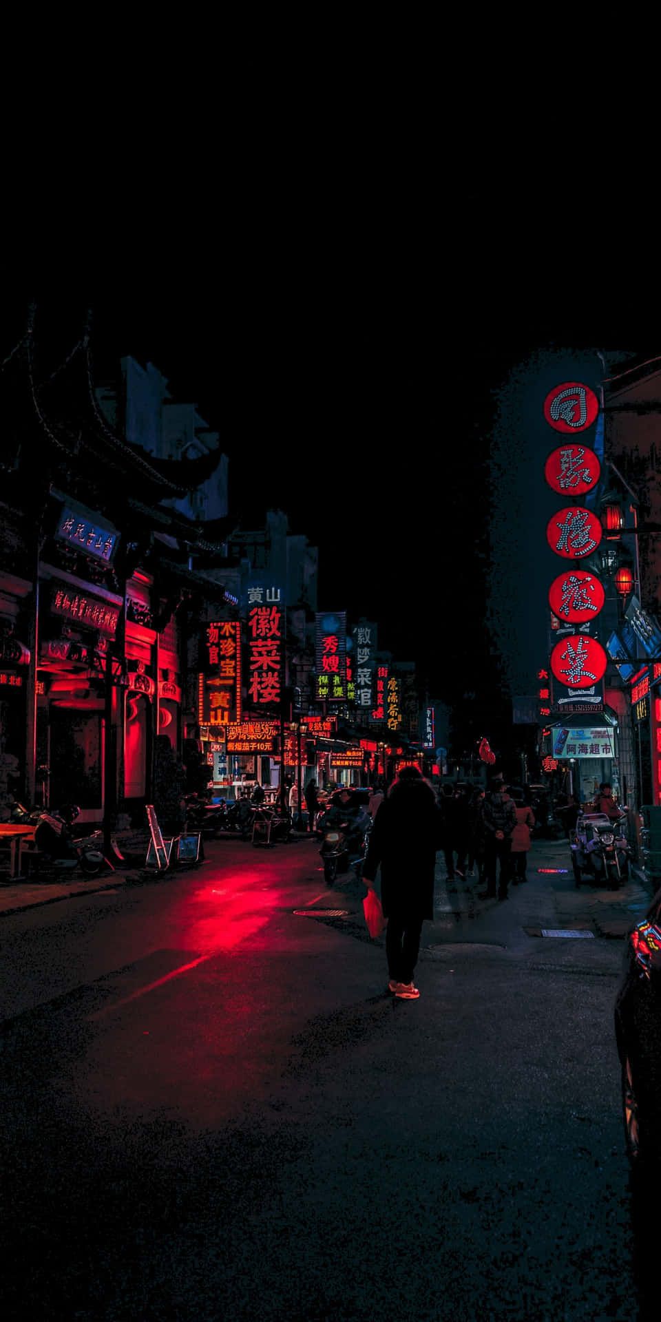 A city street at night with red neon lights - Cyberpunk