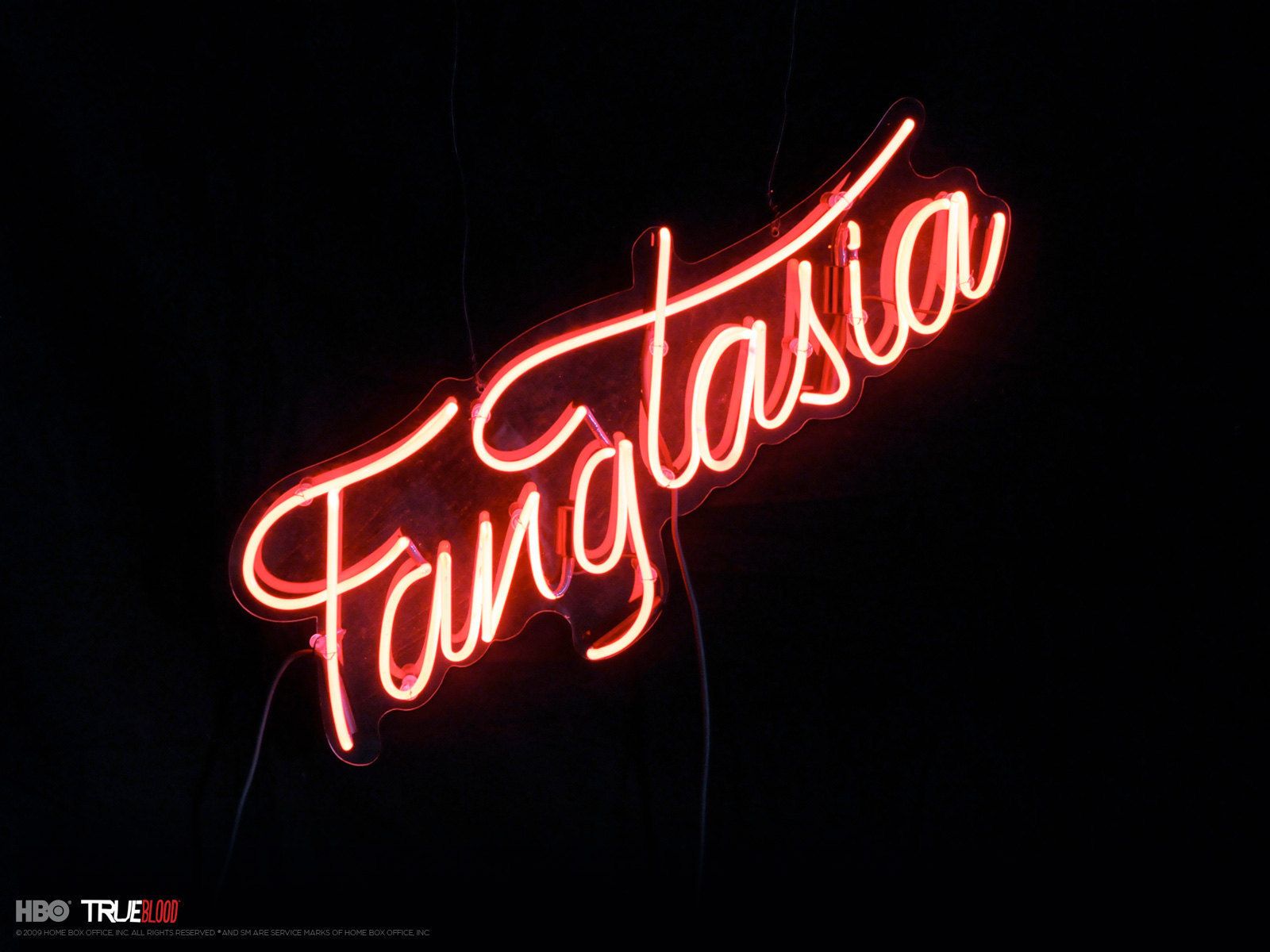 A neon sign that says fantasia - Blood