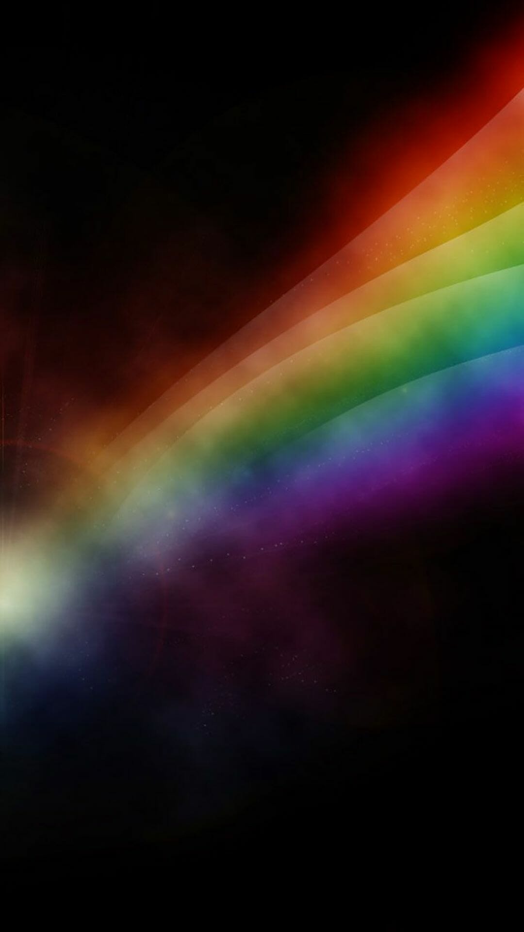 A rainbow is shining through the night sky - Rainbows