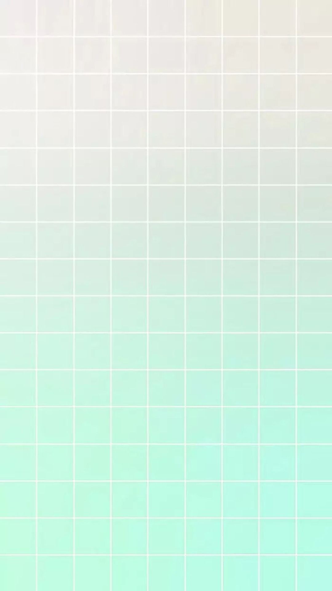 A green and white tile wall - Grid