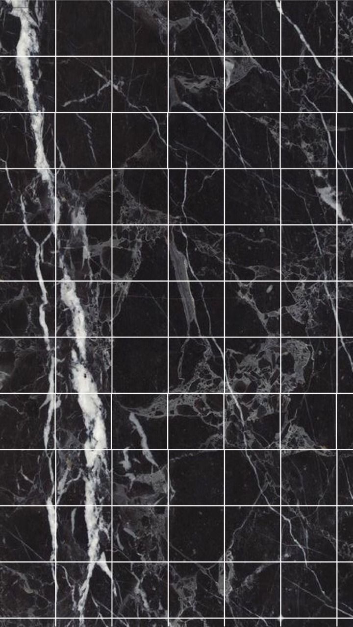 A black marble tile with white lines - Grid