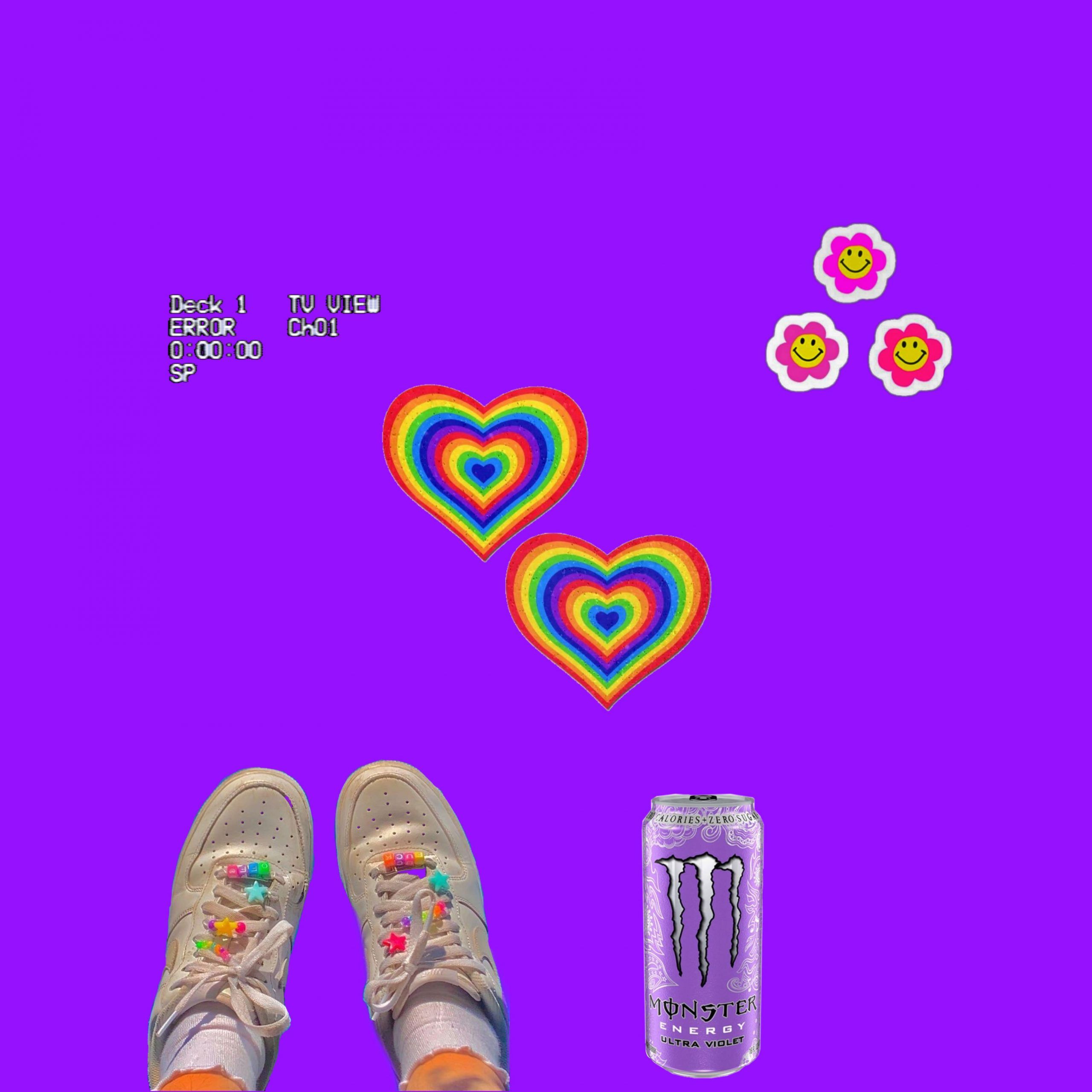 A pair of white shoes with rainbow heart and flower stickers on them. - Indie