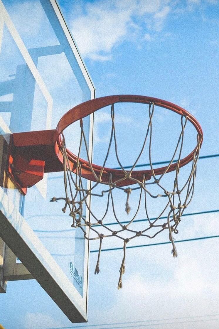 A basketball hoop with the net in it - Basketball