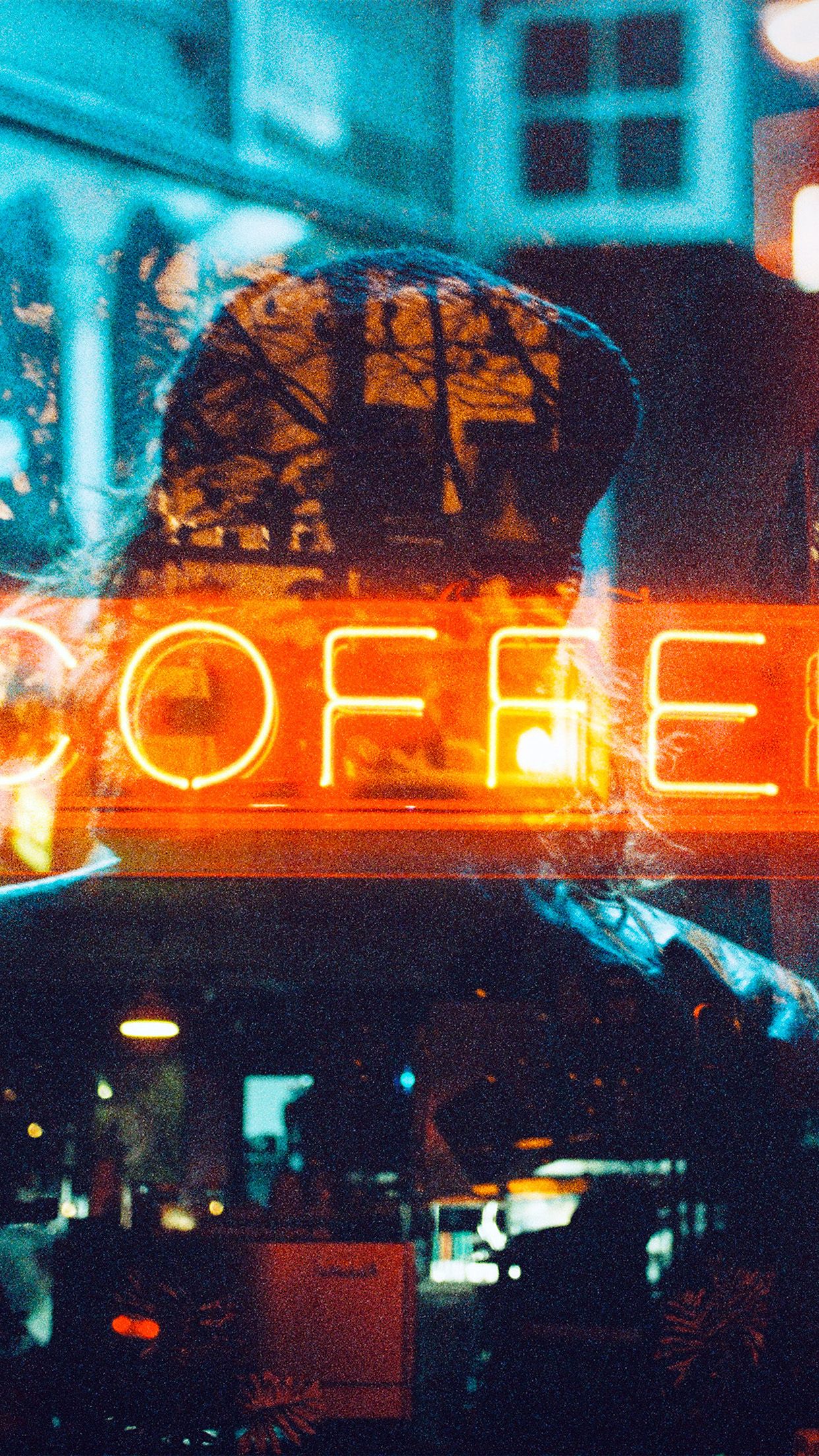 A neon sign that says coffee in red and blue - Neon orange