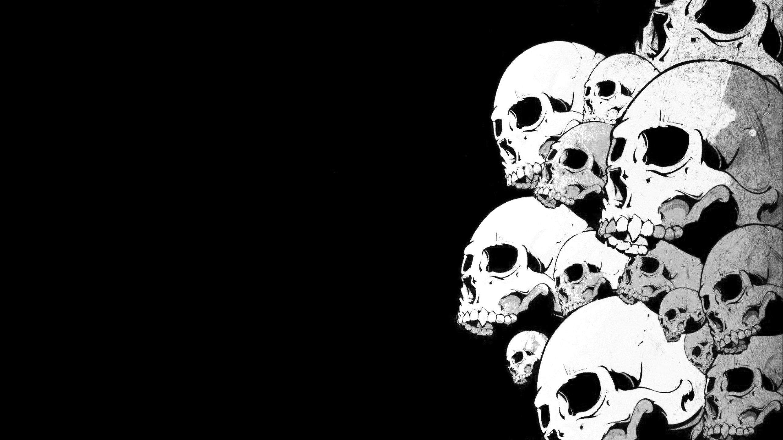 A black and white image of skulls - Horror, skull