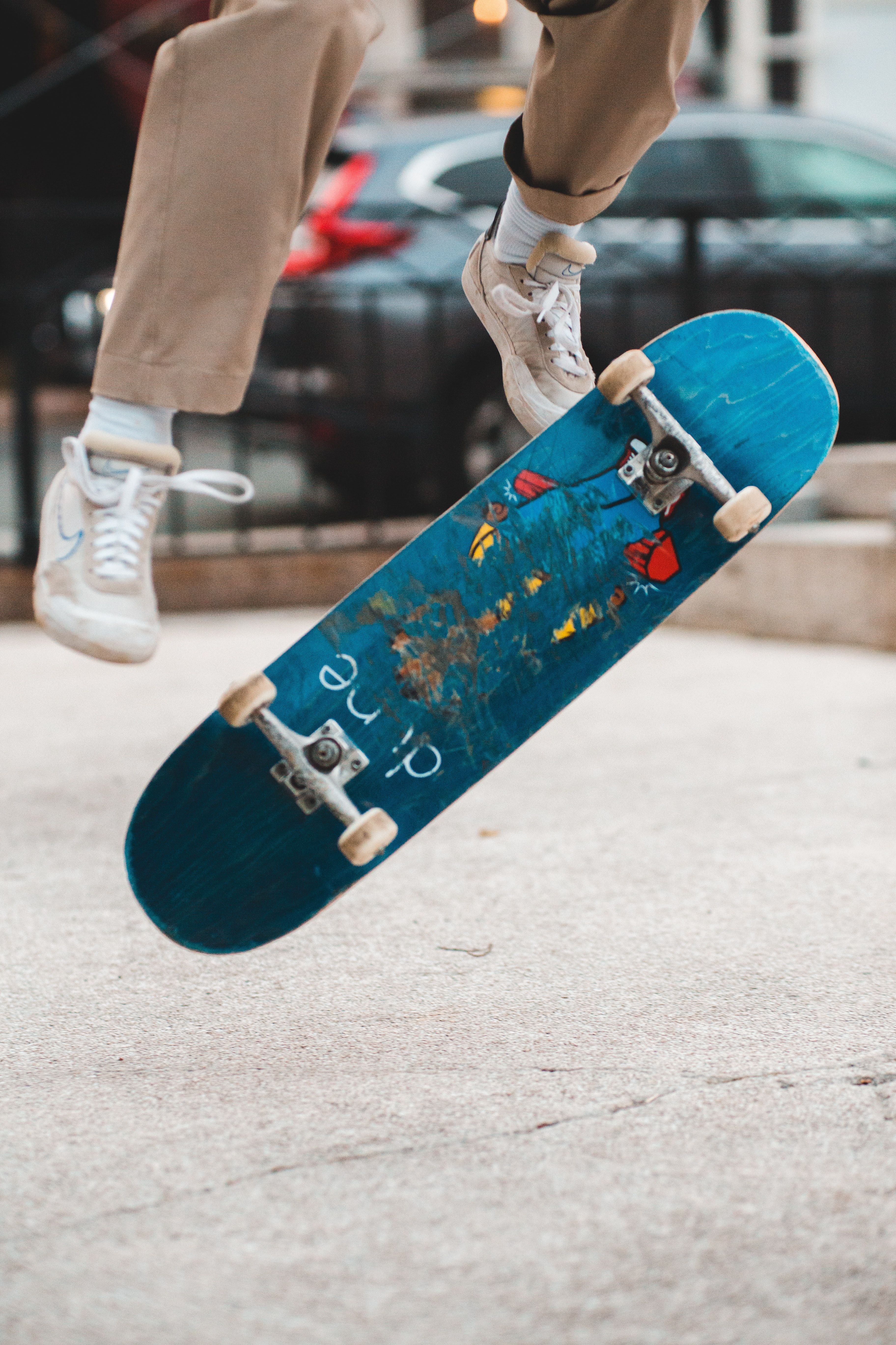Cool black teenager doing skateboard trick · Free