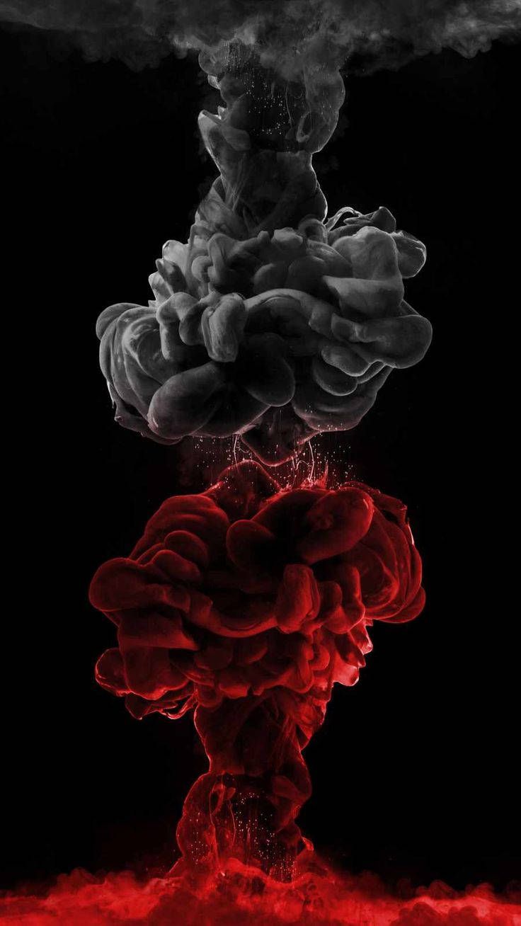 Black and red smoke in a dark background - Smoke