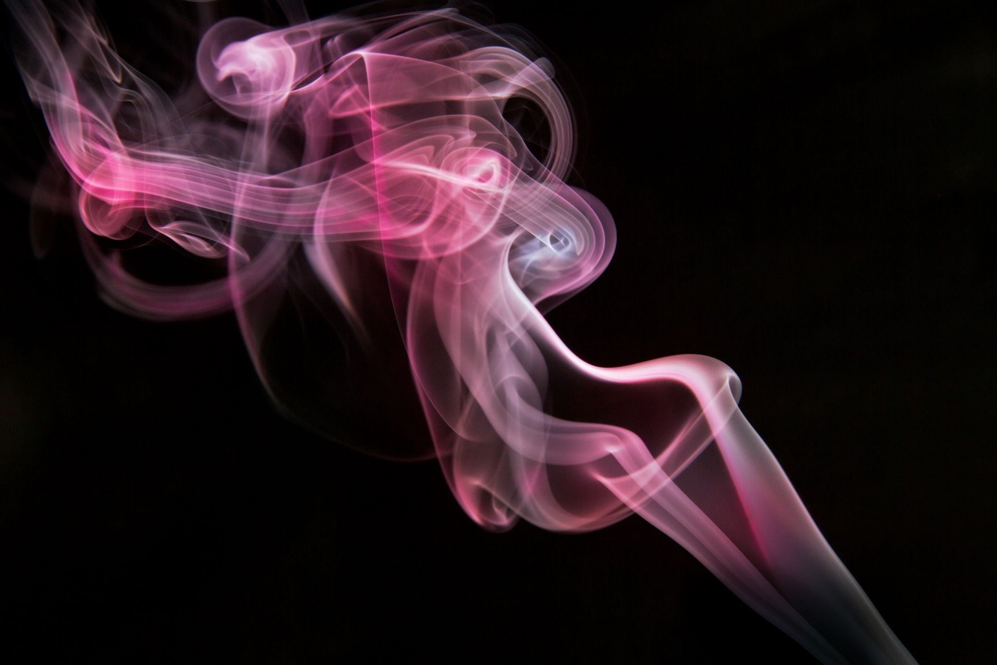 A pink smoke is blowing out of the top - Smoke