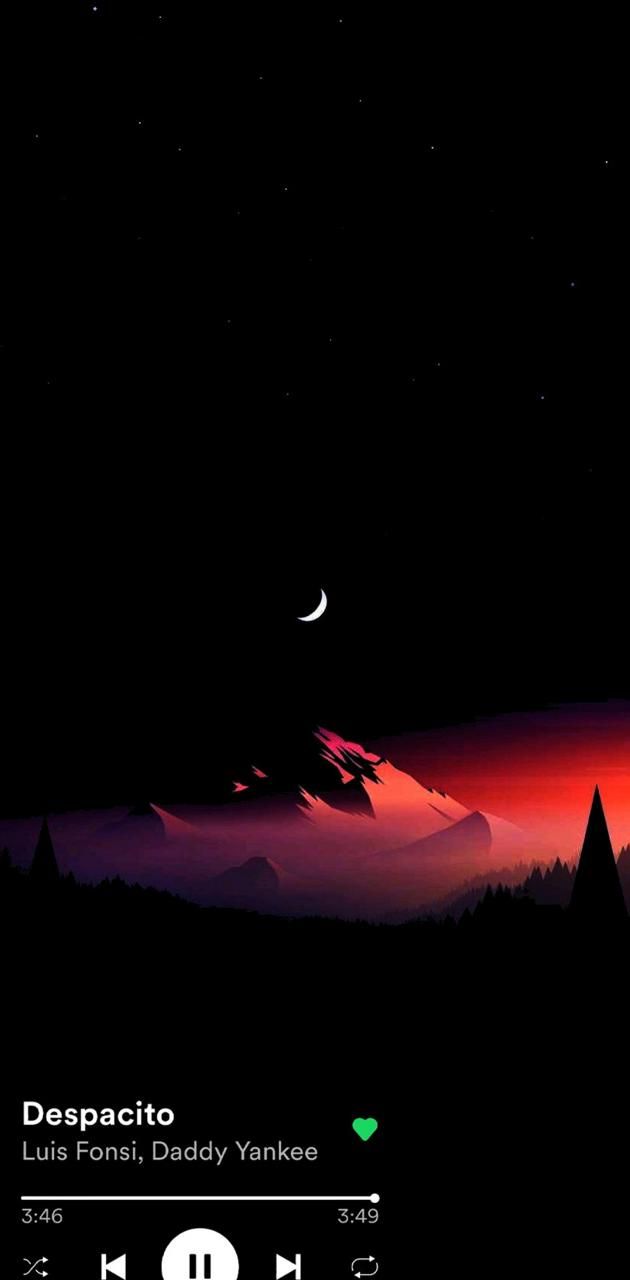 A Spotify player with a dark background and a mountain scene with a half moon. - Spotify