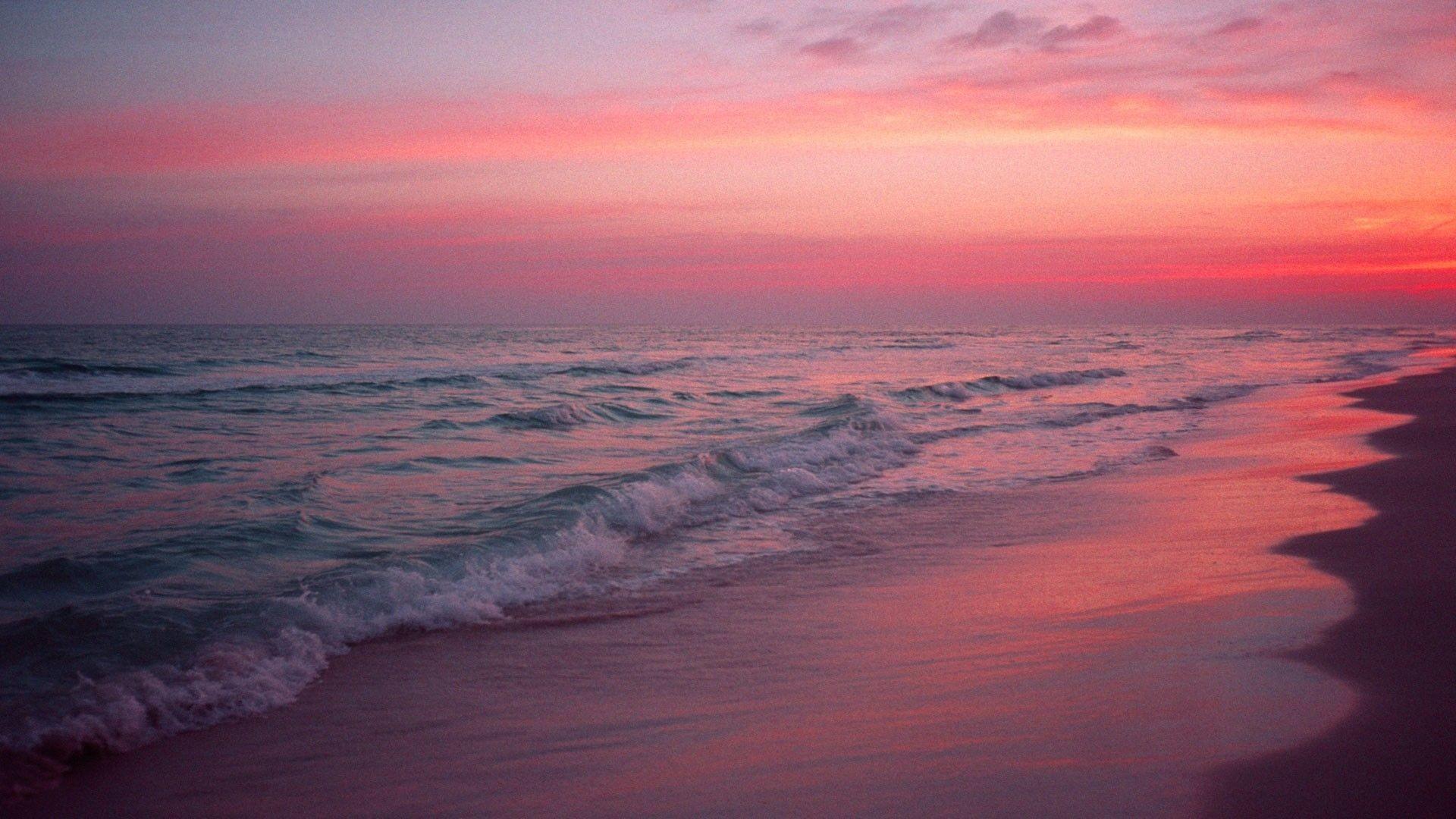 Pink sunset over the ocean wallpaper - Beach