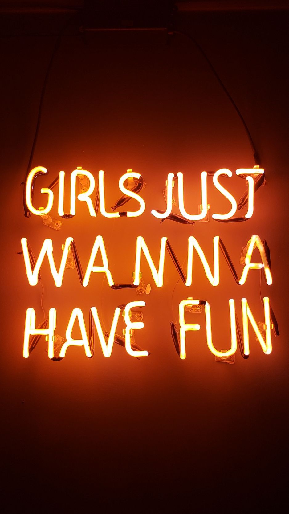 A neon sign that says girls just wanna have fun - Neon