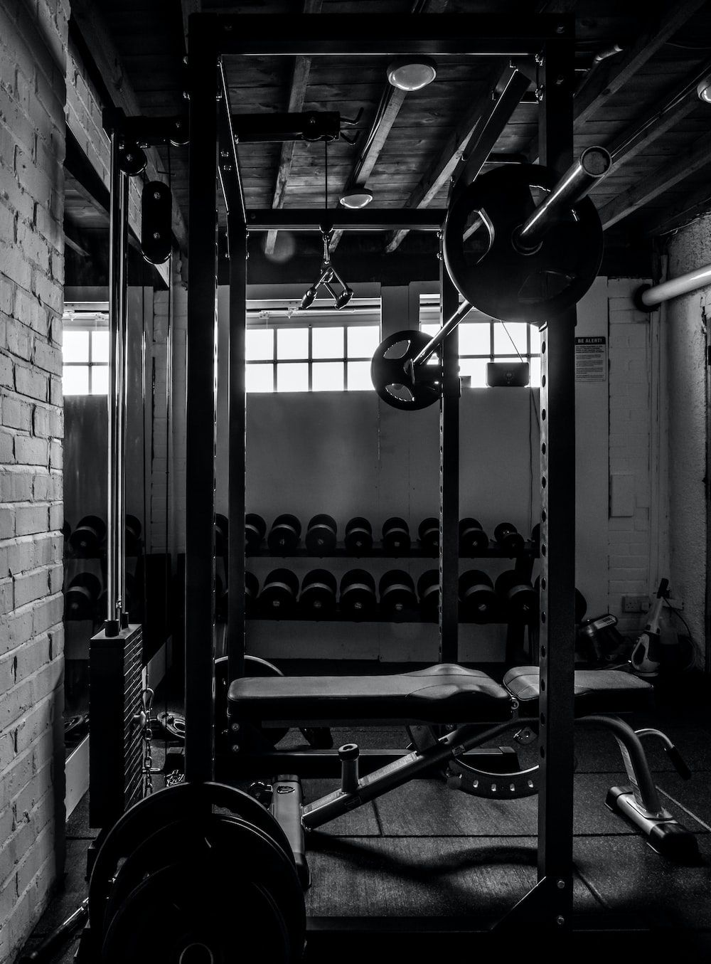 A black and white photo of an empty gym - Gym