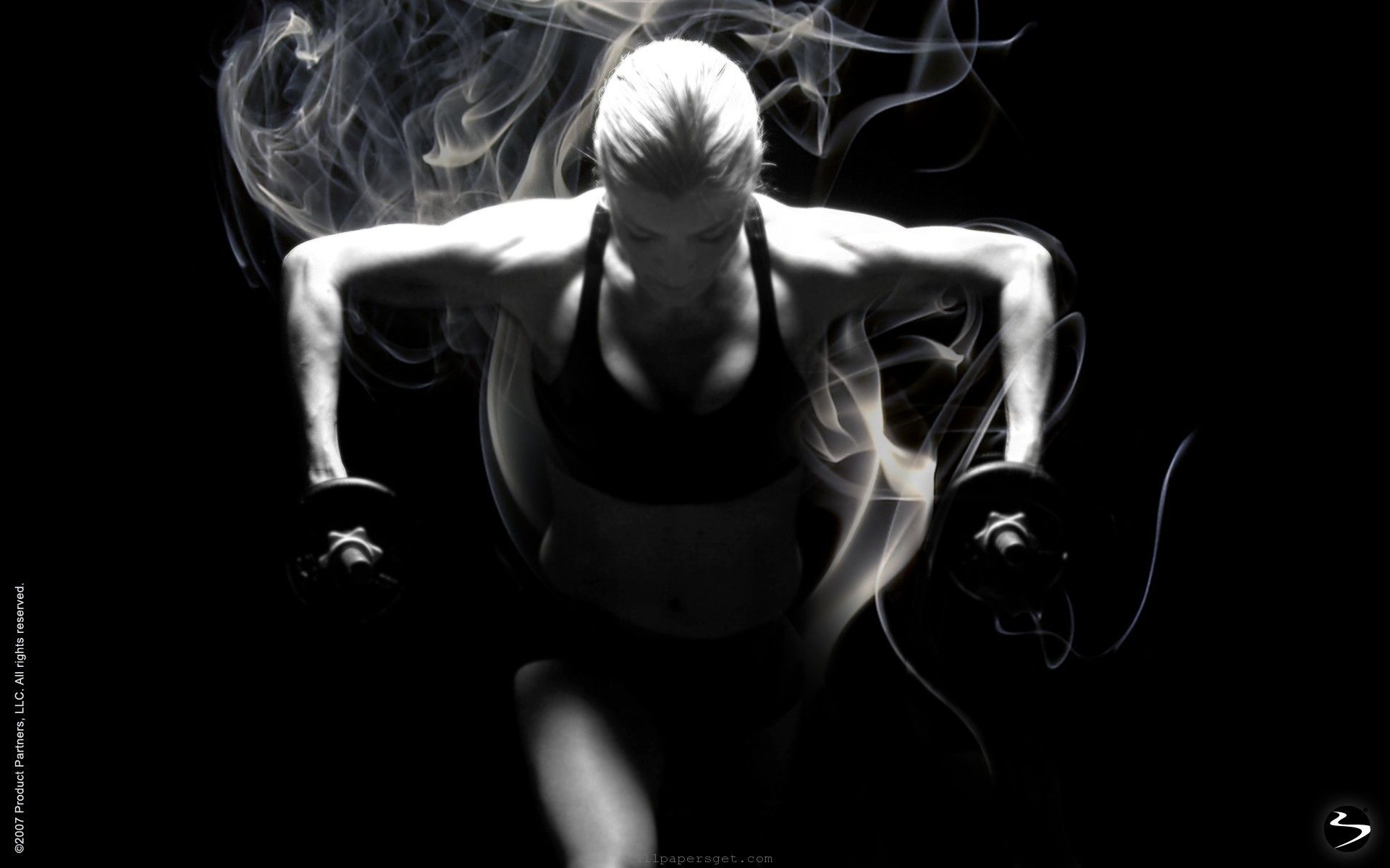 Fitness girl with smoke on a black background - Gym