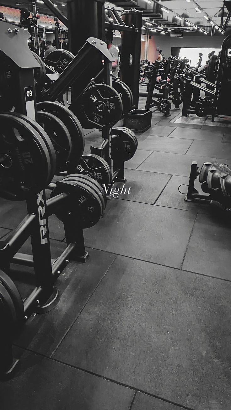 A black and white photo of an empty gym - Gym