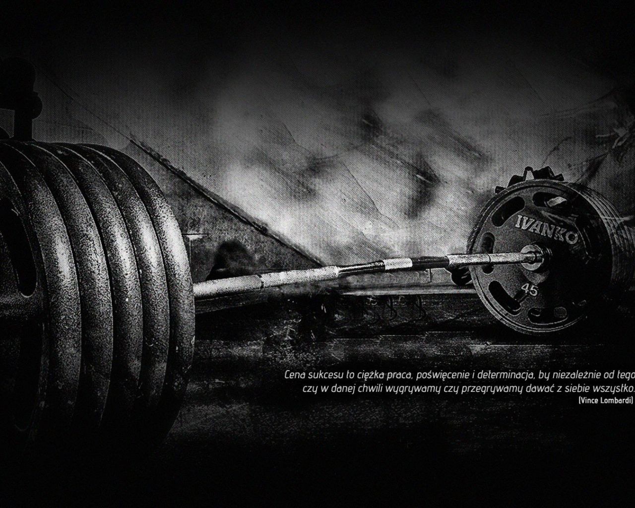 A barbell and weights on the ground - Gym