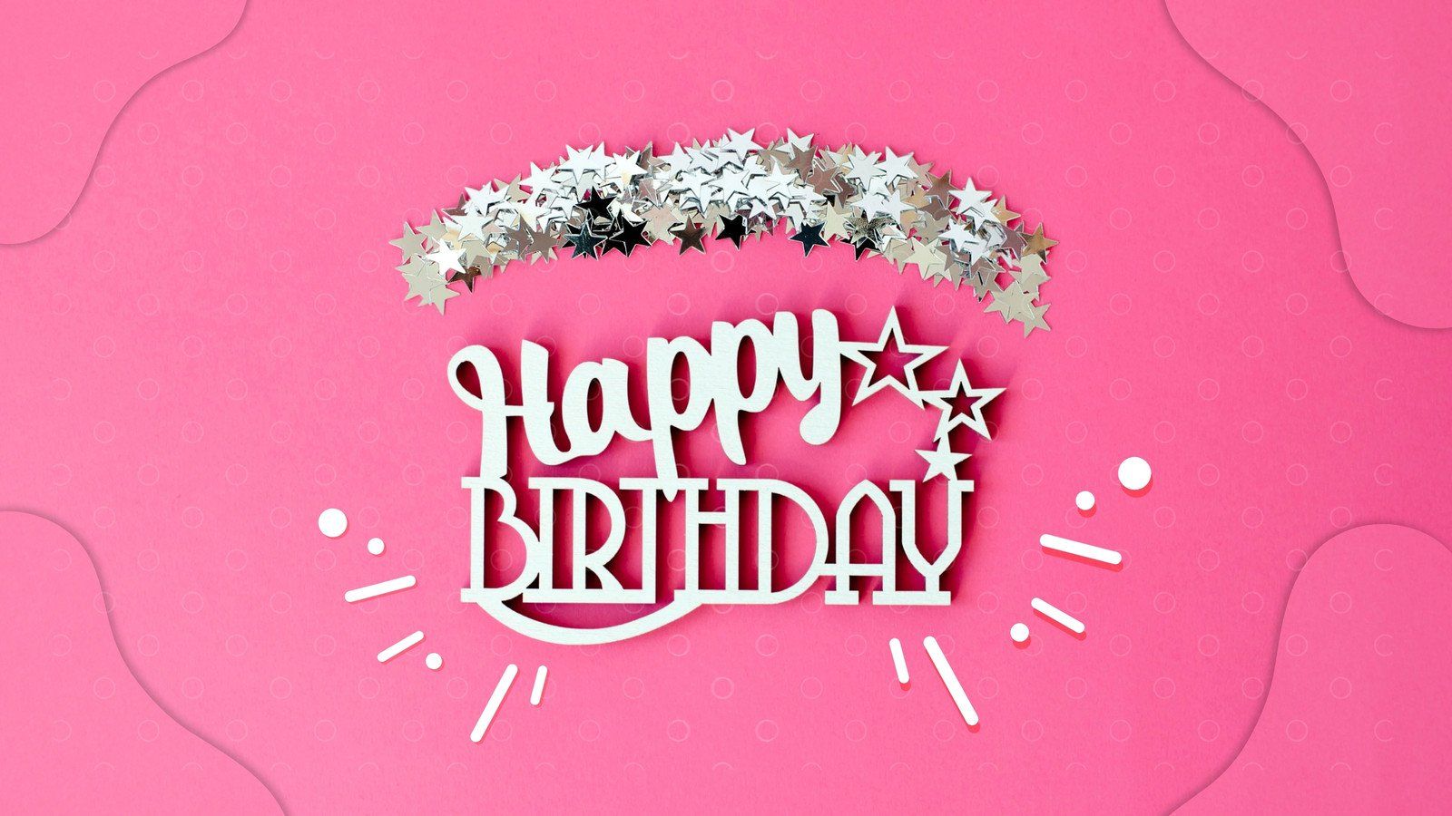A pink background with a silver happy birthday sign - Birthday
