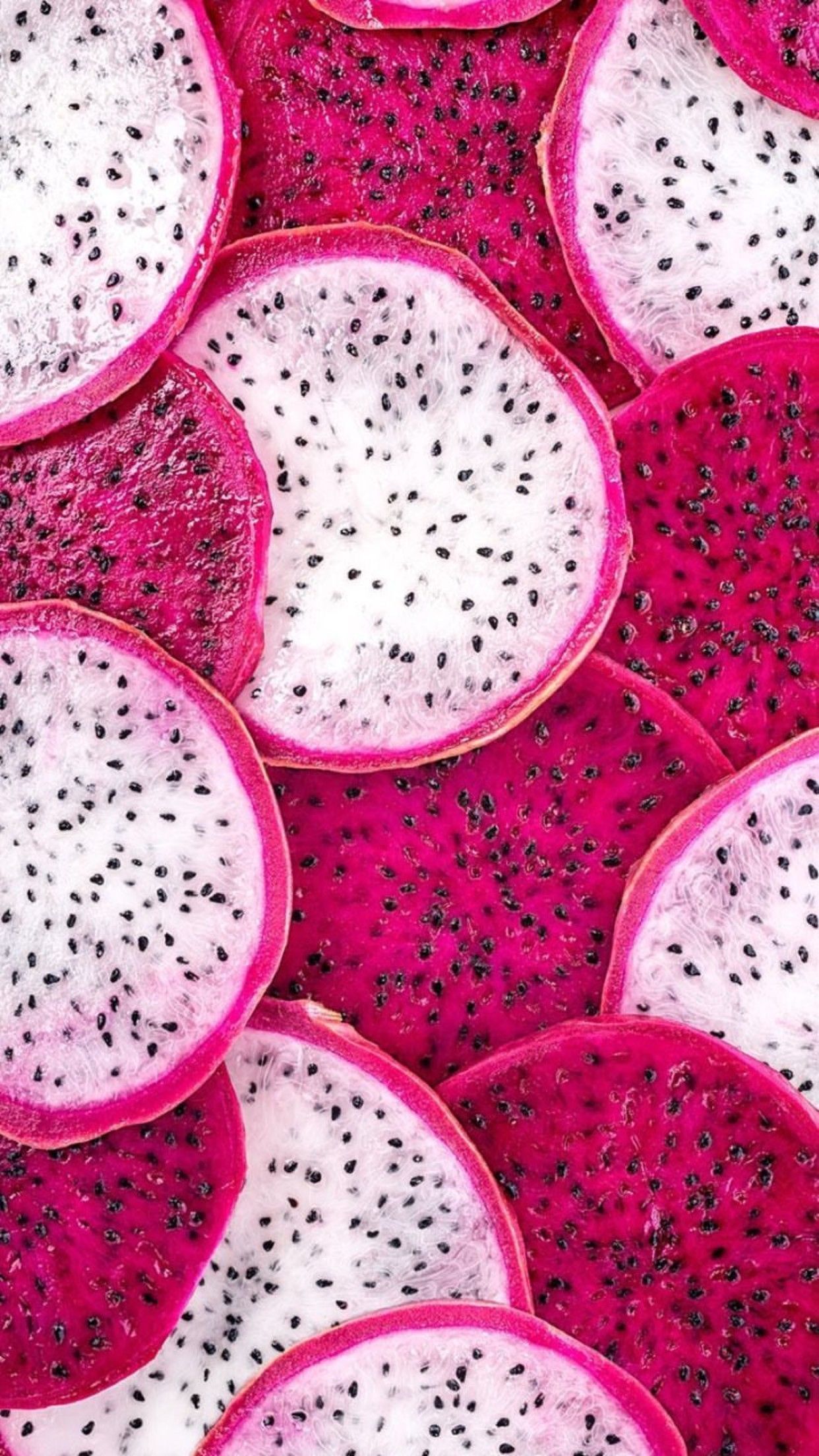 A close up of dragon fruit slices - Fruit