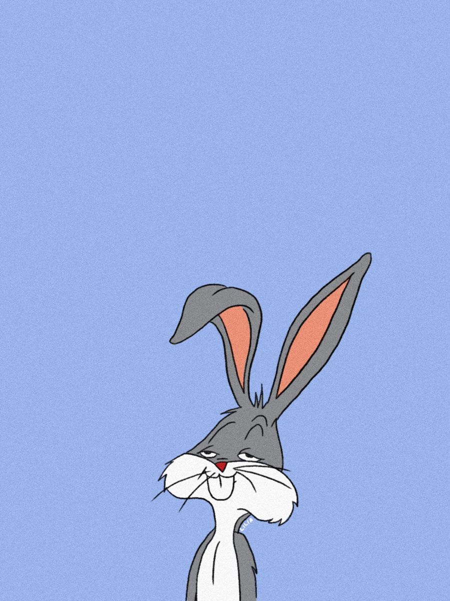 A cartoon rabbit with big ears is standing on its hind legs - Bugs Bunny