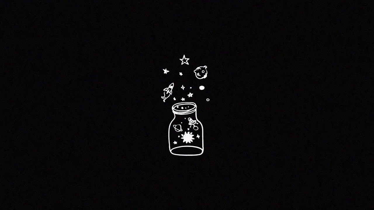 A white jar filled with stars, planets, and a sun on a black background - Dior