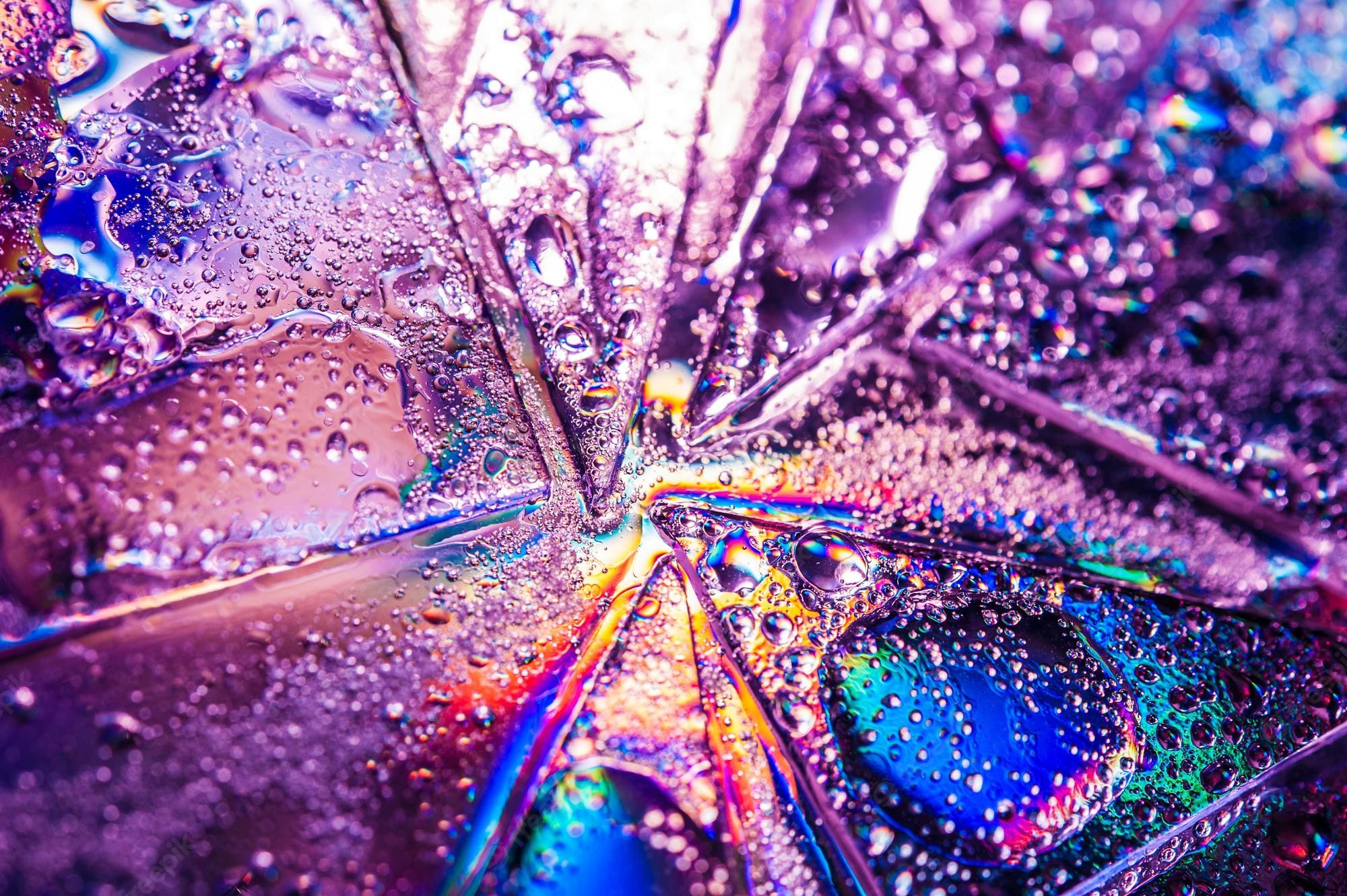 An abstract image of a colorful umbrella with water droplets on it - Bright, water, vaporwave