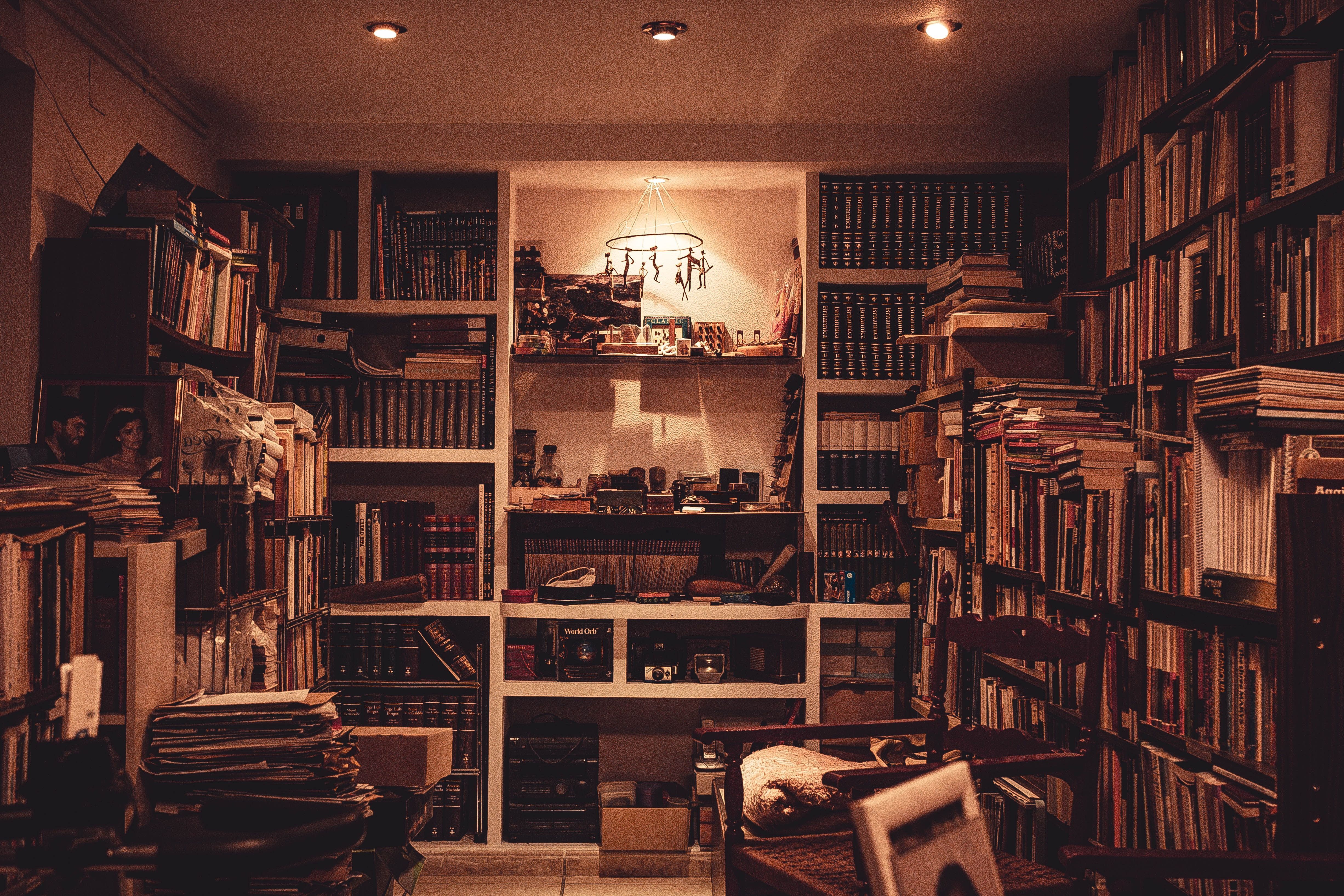 A room with many books on the shelves - Bookshelf, library