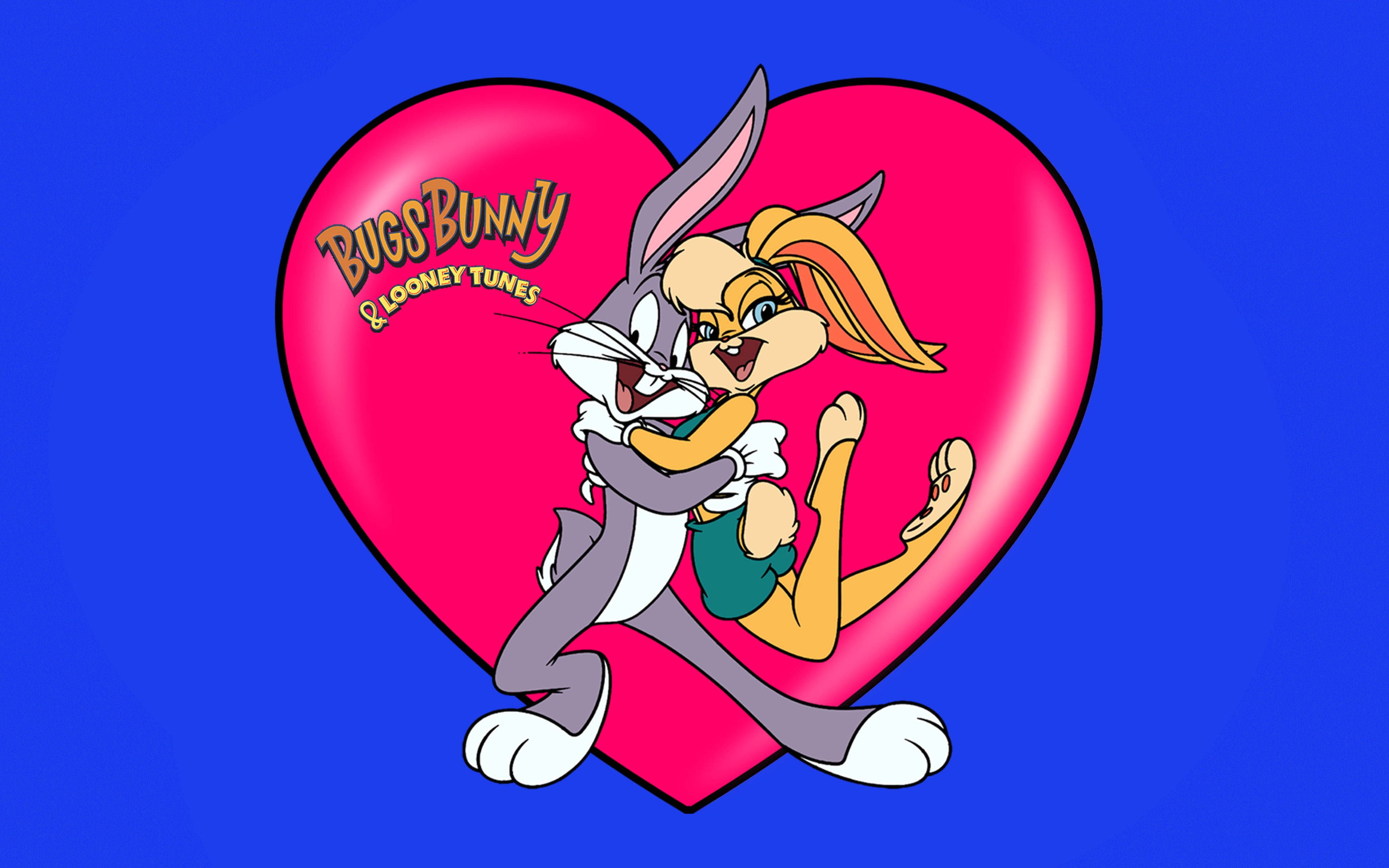 A cartoon character is holding an animated heart - Bugs Bunny