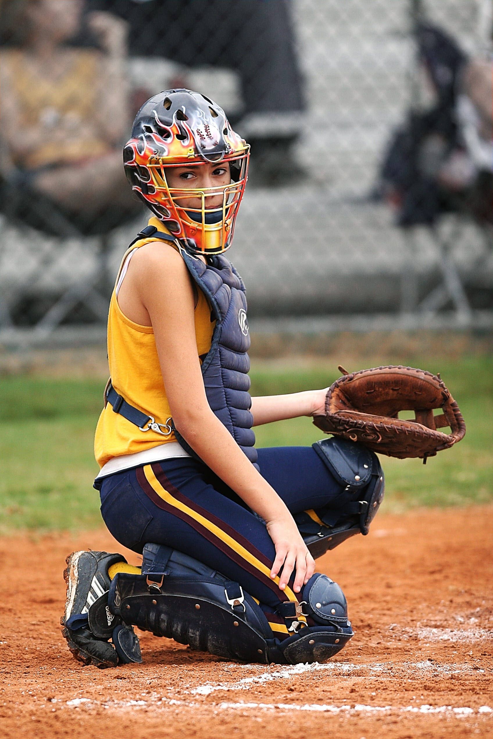 Download Softball Catcher With Flame Designed Helmet Wallpaper