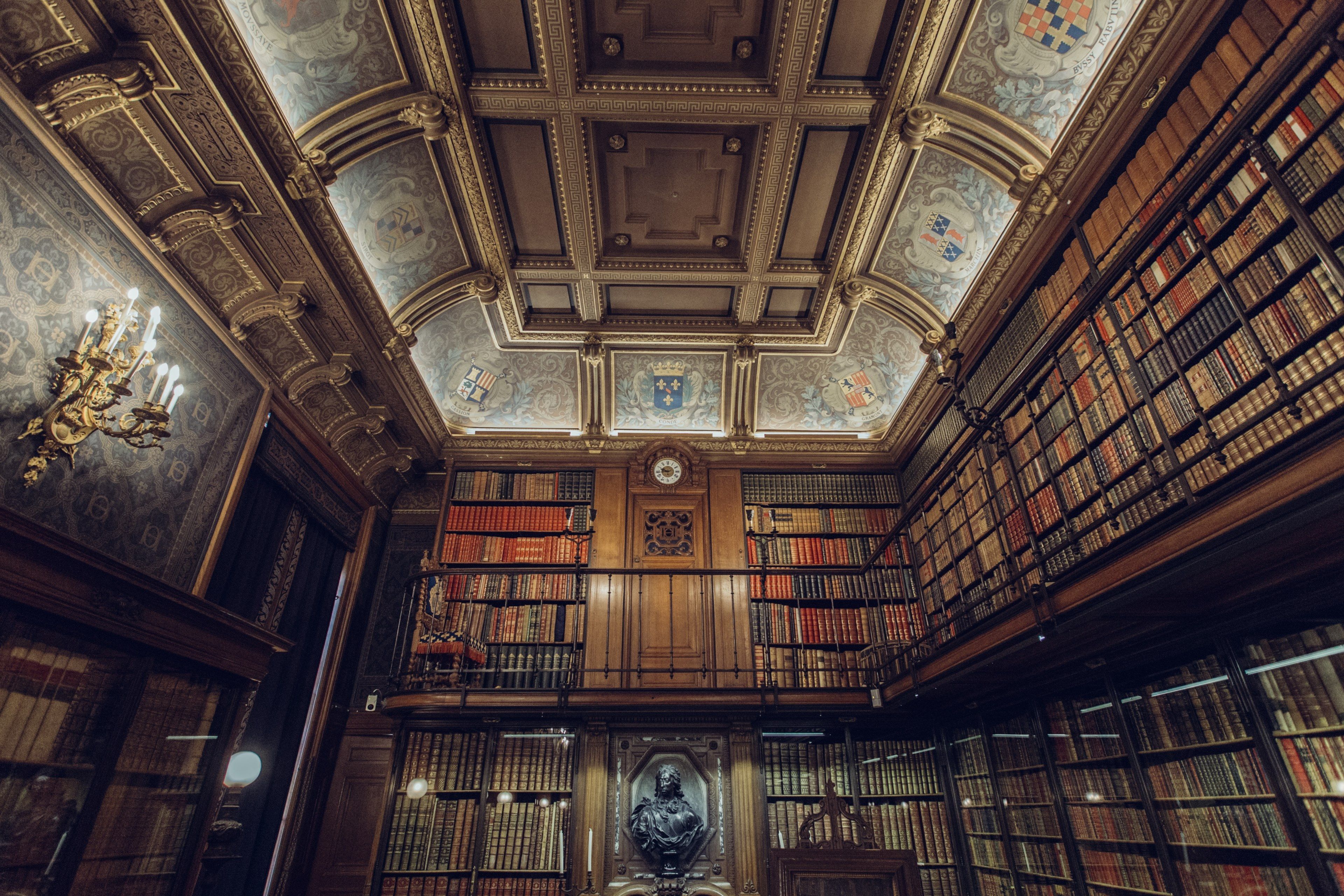 Wallpaper / a large library or study filled with lots of books ornate ceilings and two levels in chantilly, chantilly library study 4k wallpaper free download