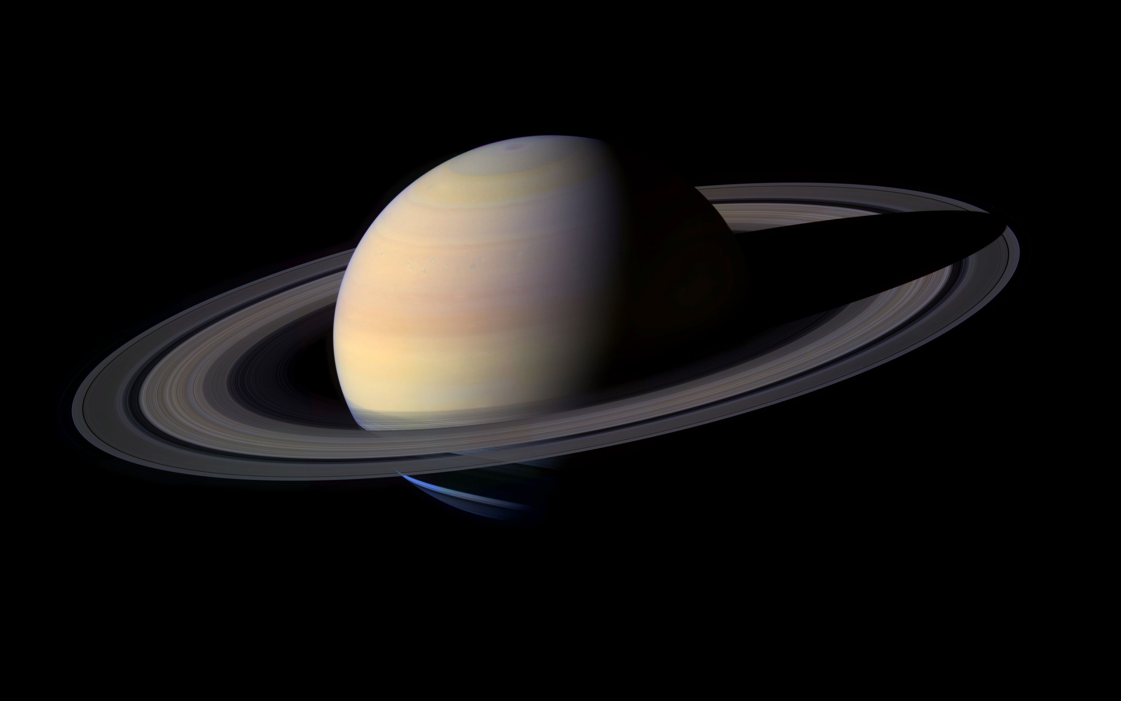 A planet with rings around it in space - Saturn