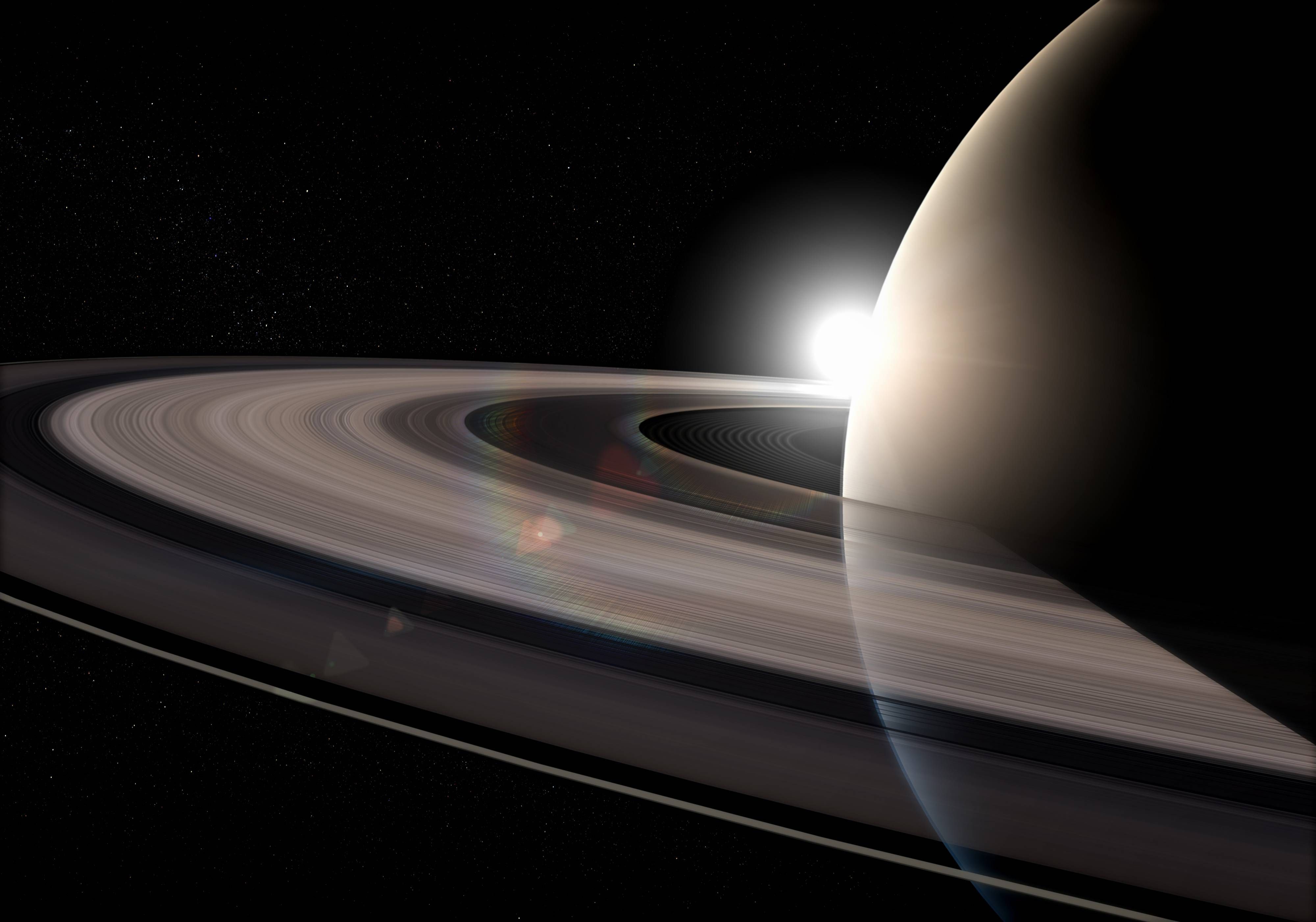 An artist's impression of the Cassini spacecraft diving between Saturn and its innermost rings. - Saturn