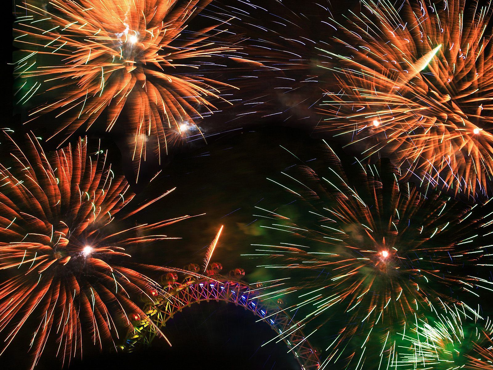 Fireworks light up the sky over the Sydney Harbour Bridge - New Year