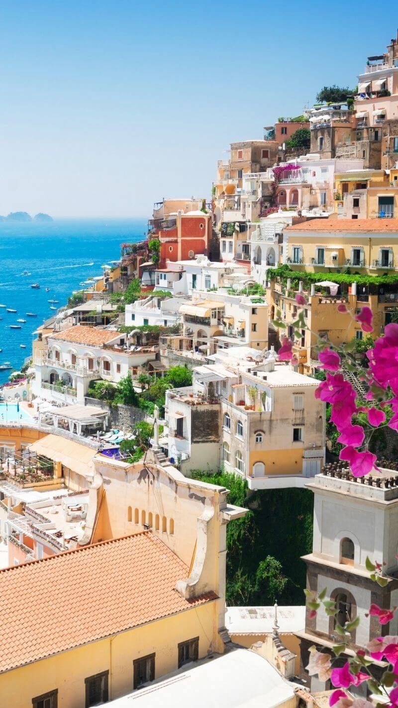 The beautiful Positano town in Italy with flowers and sea in the background - Photography, Italy, travel