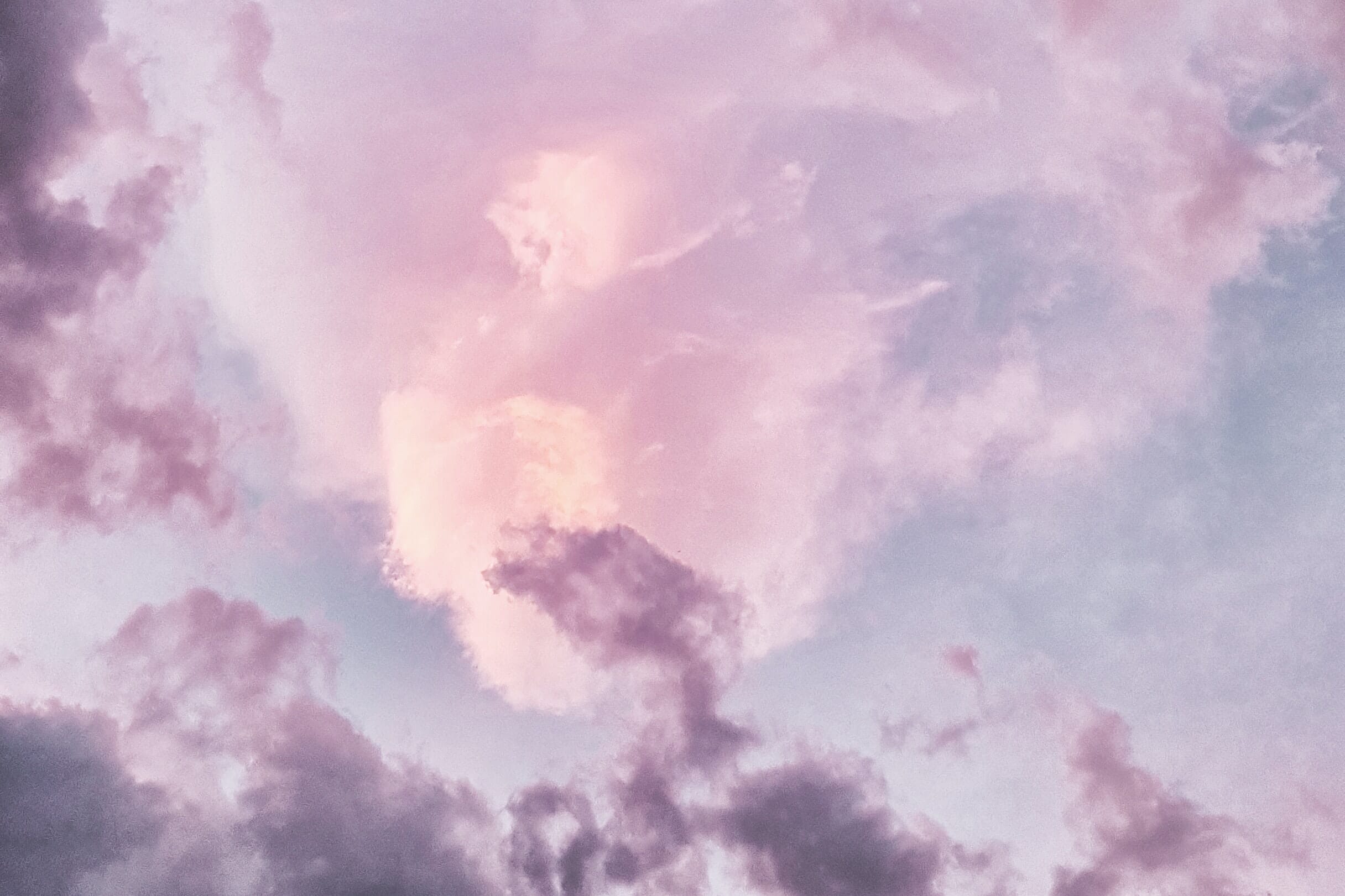 A sky with clouds that look like a cotton candy. - Photography