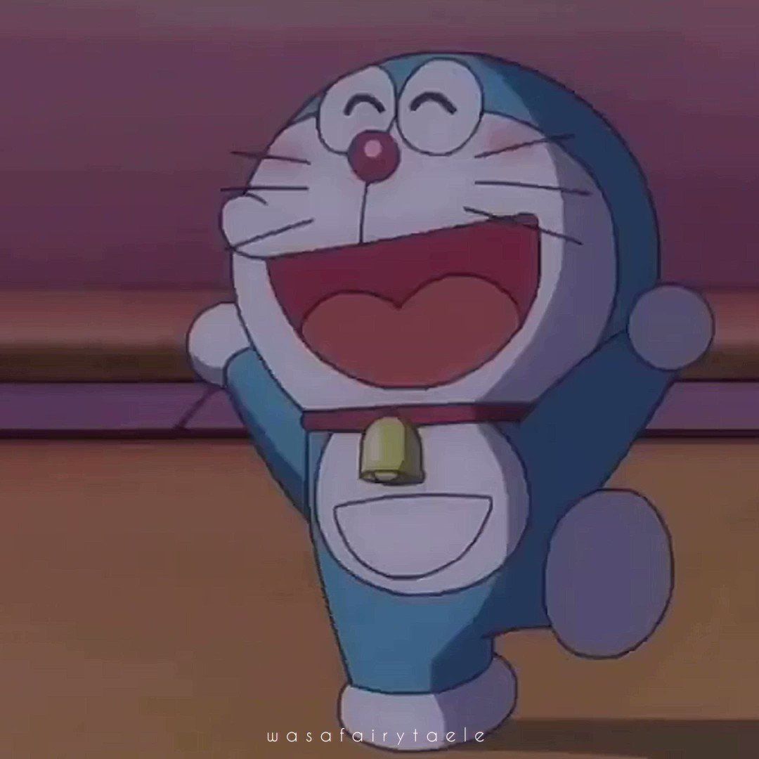 Doraemon laughing with his arms up - Doraemon