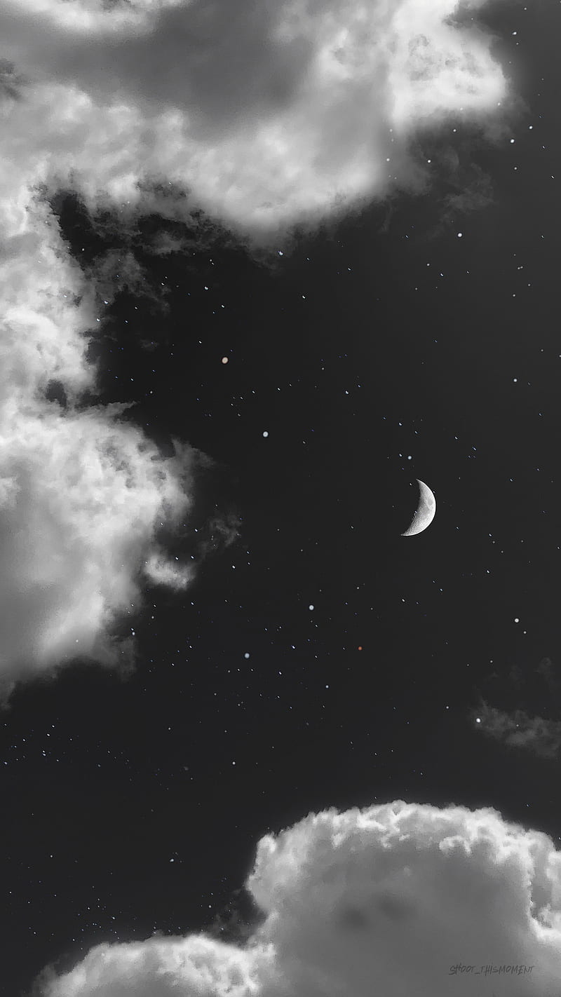 A black and white photo of the moon in clouds - Black, magic, black and white