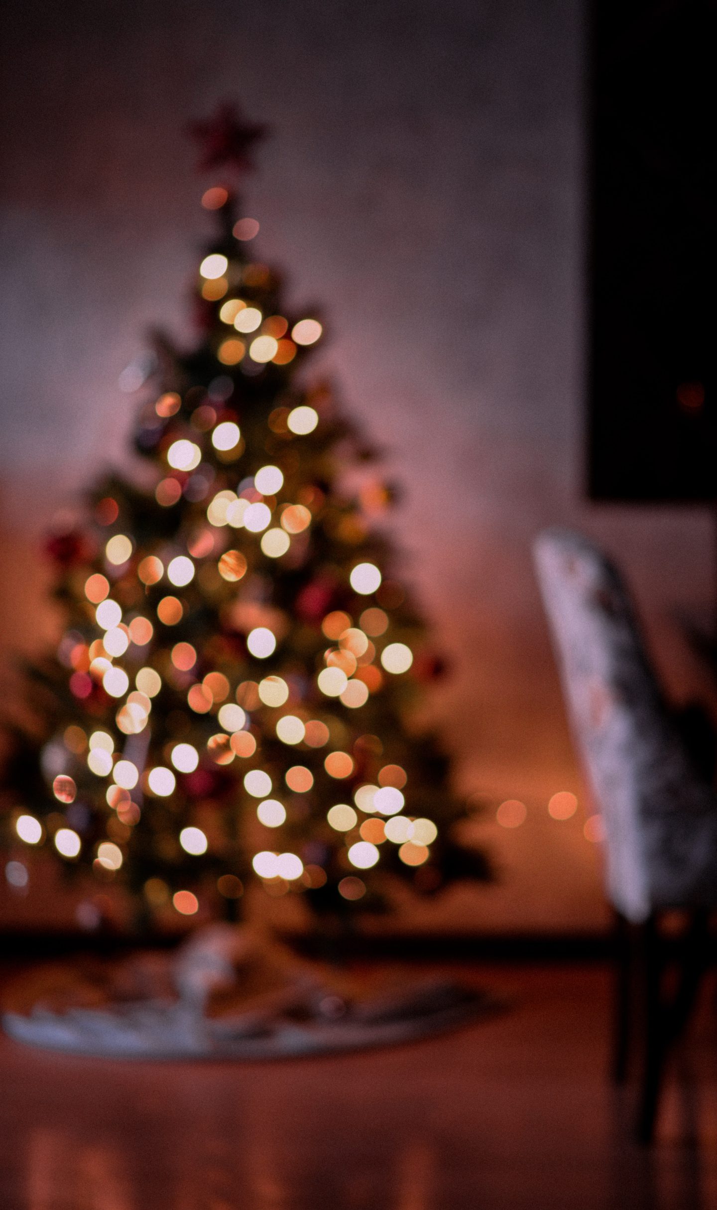 A blurry photo of a Christmas tree with lights on it. - Christmas, Christmas lights, cute Christmas, white Christmas
