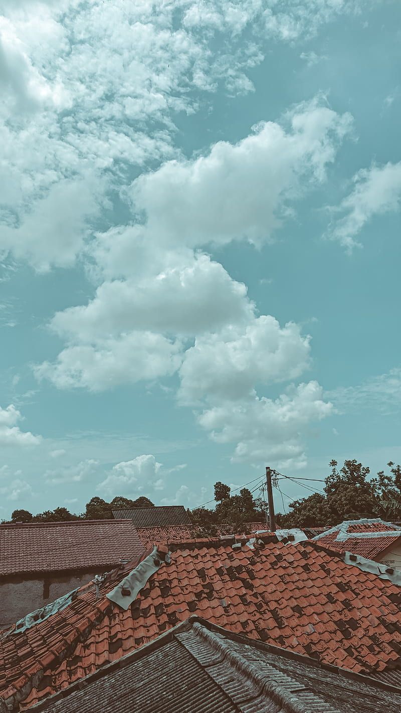 A red roofed building with some clouds in the sky - Teal, iPhone, phone, vintage, HD, sky, vintage clouds