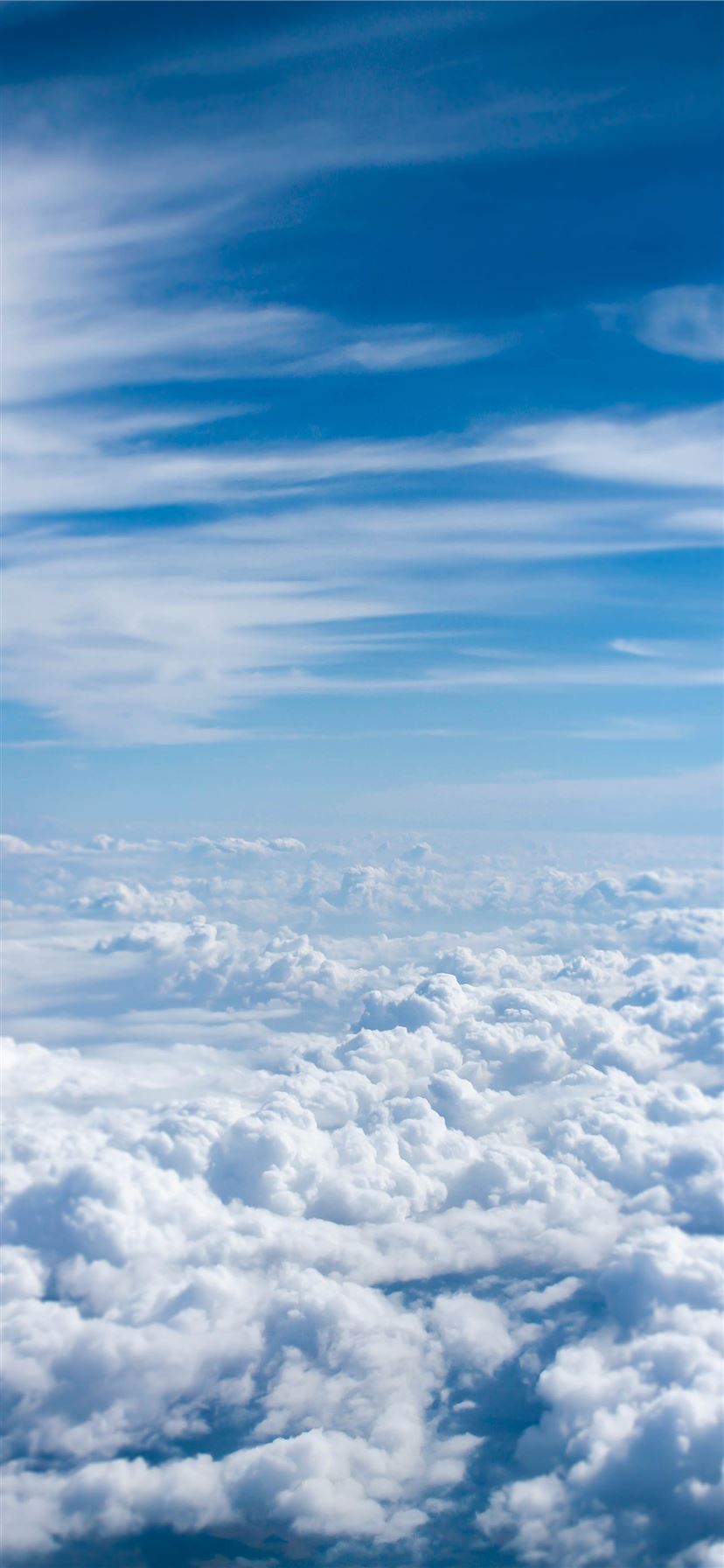above cloud photo of blue skies iPhone 11 Wallpaper Free Download