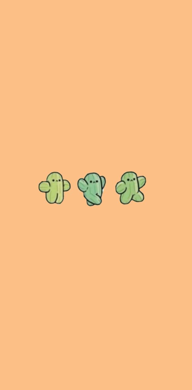 Three green turtles on an orange background - Cactus