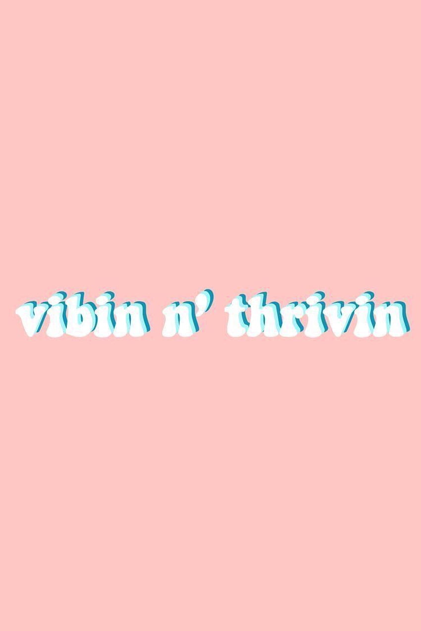 A pink background with white text that says vivin n thrivn - VSCO