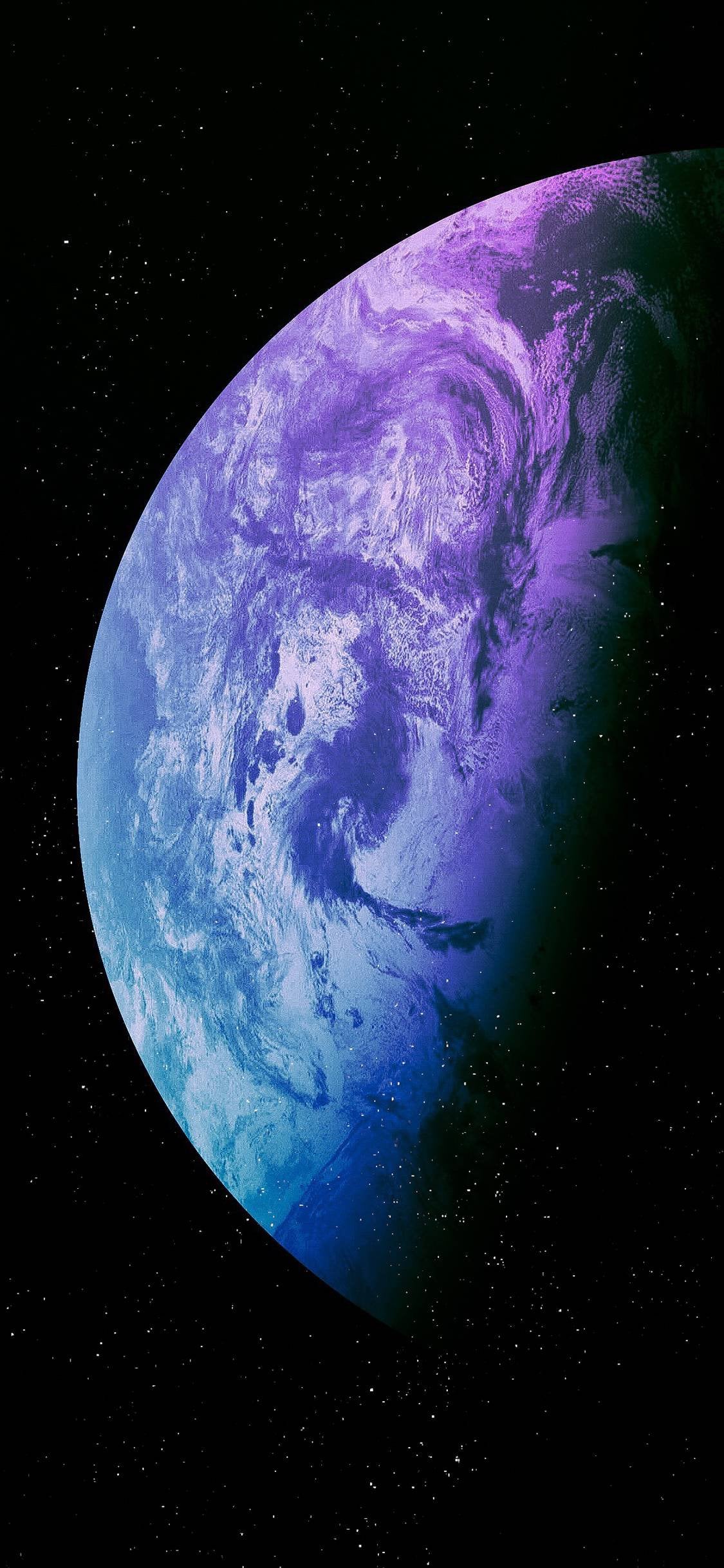 A purple and blue planet in space - Earth