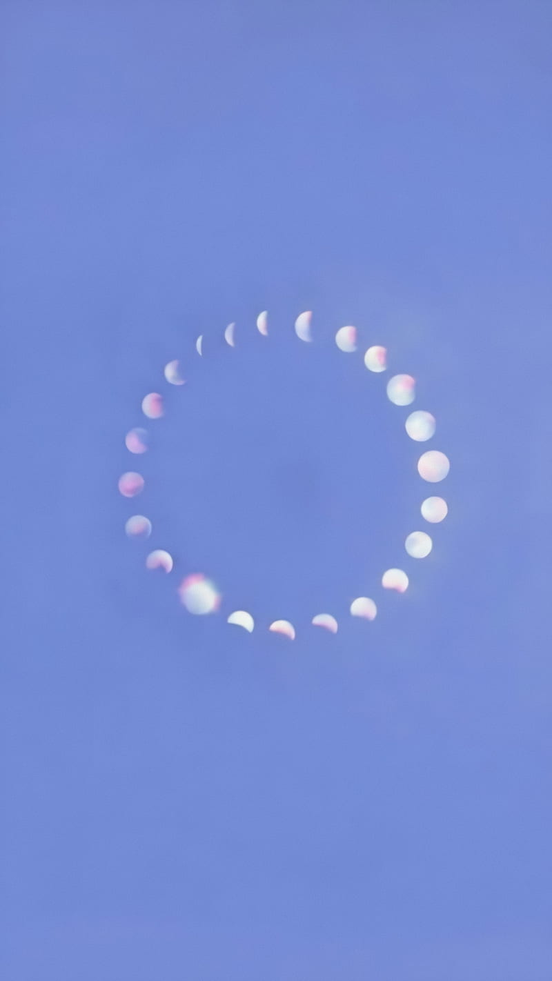 A circle of clouds in the sky - Moon phases