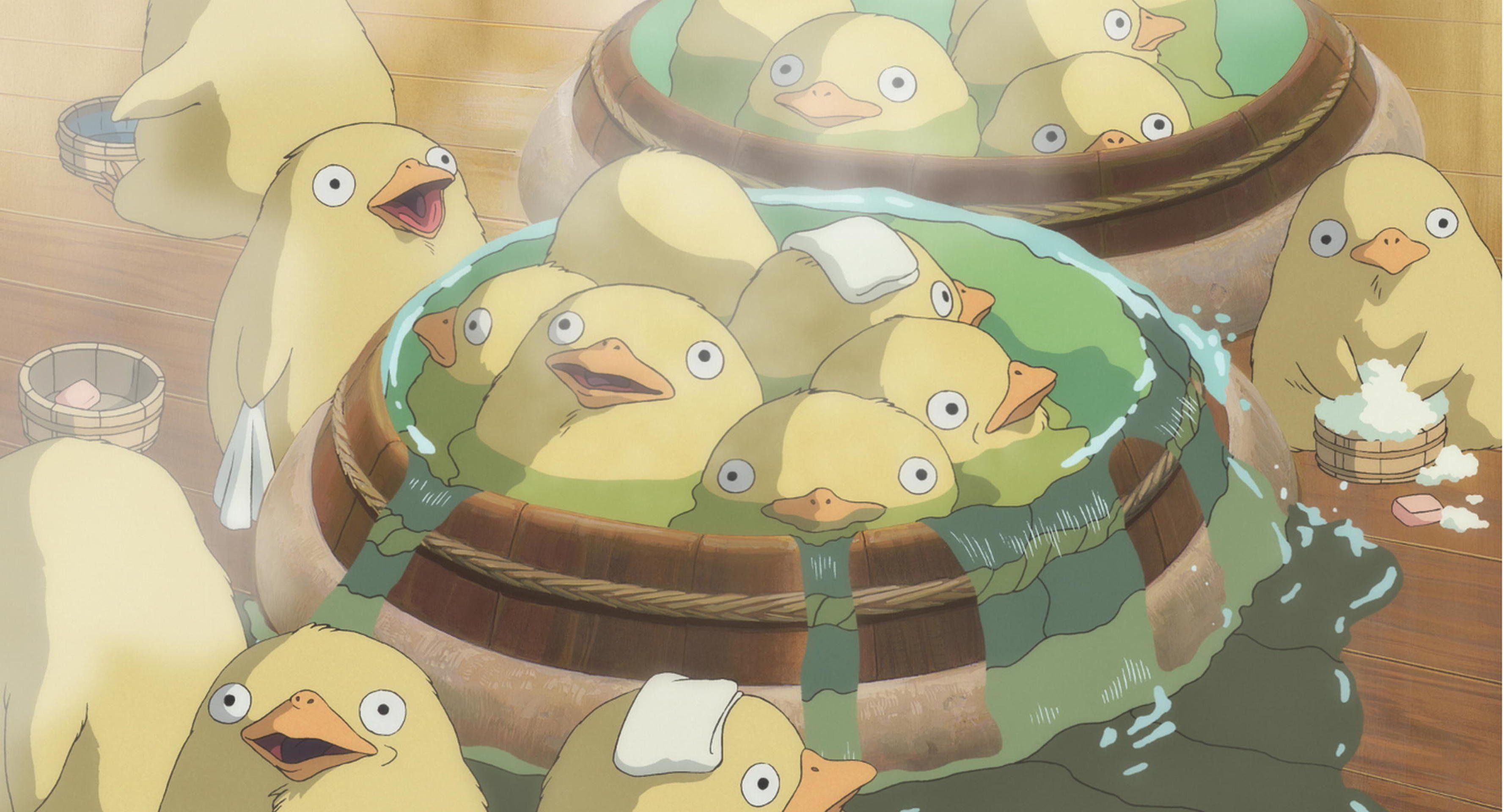 A group of yellow animated characters sit in a hot spring. - Duck