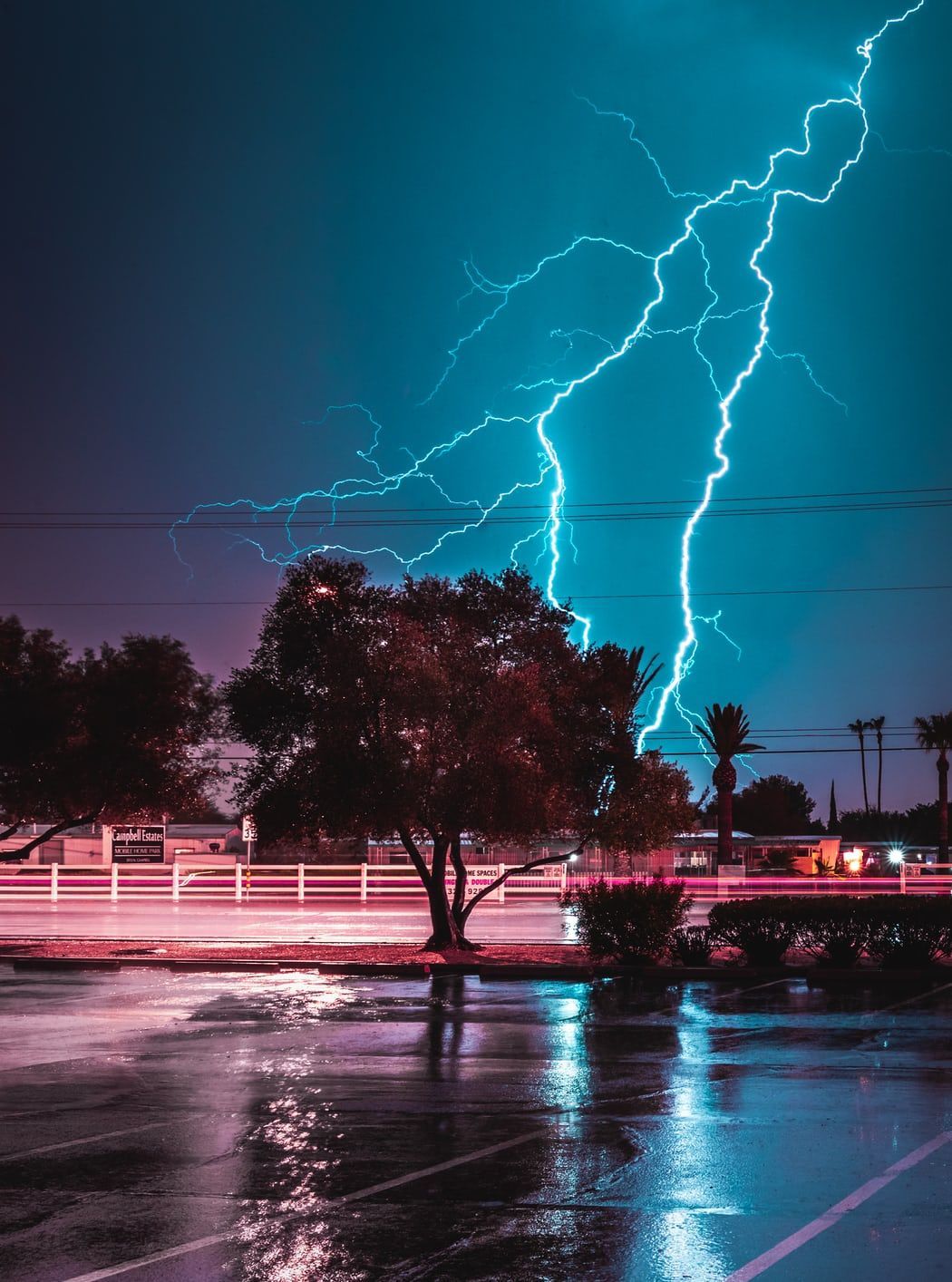 Lightning strikes over a parking lot - Lightning