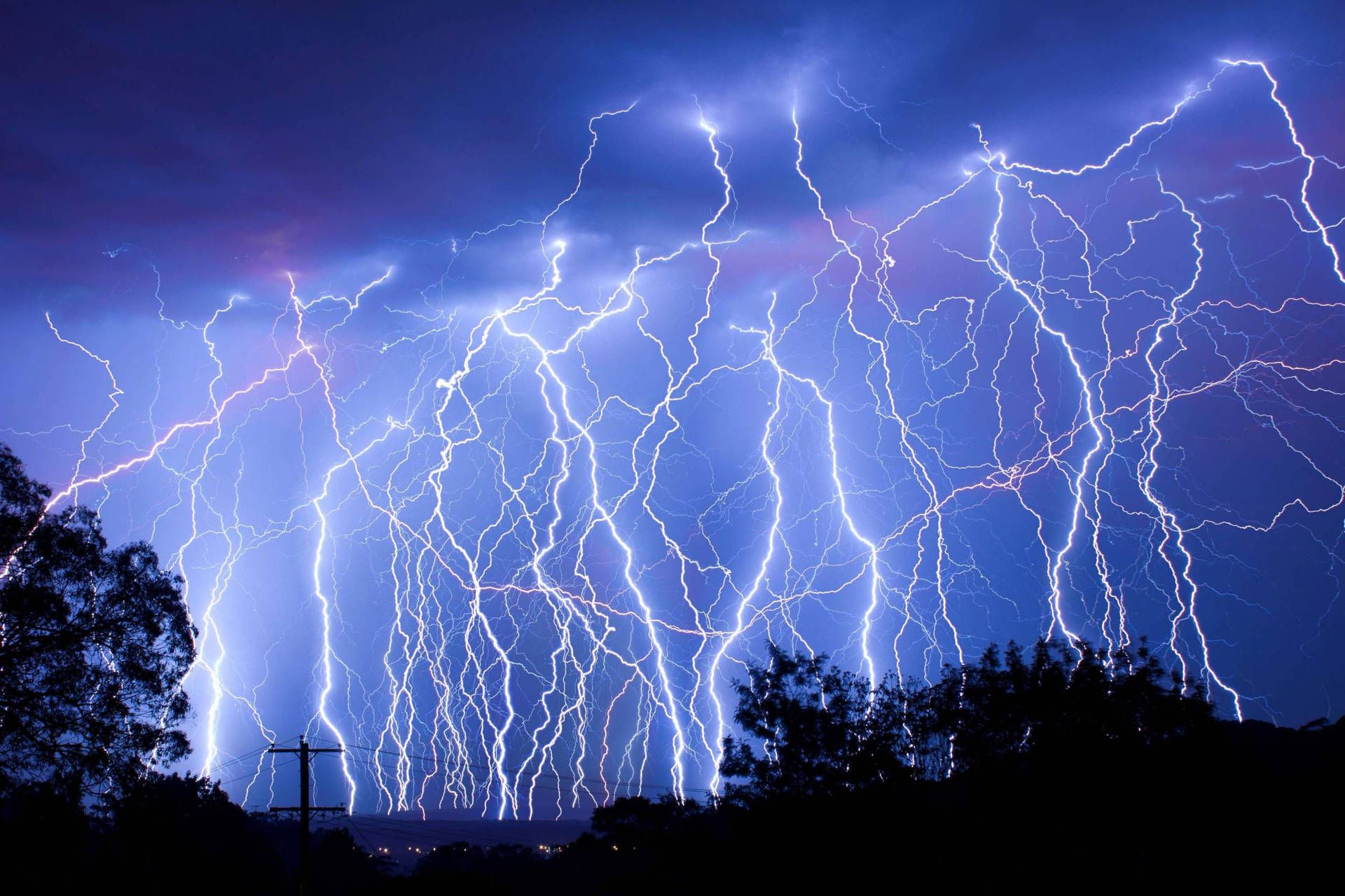 A large number of lightning strikes in the sky - Lightning